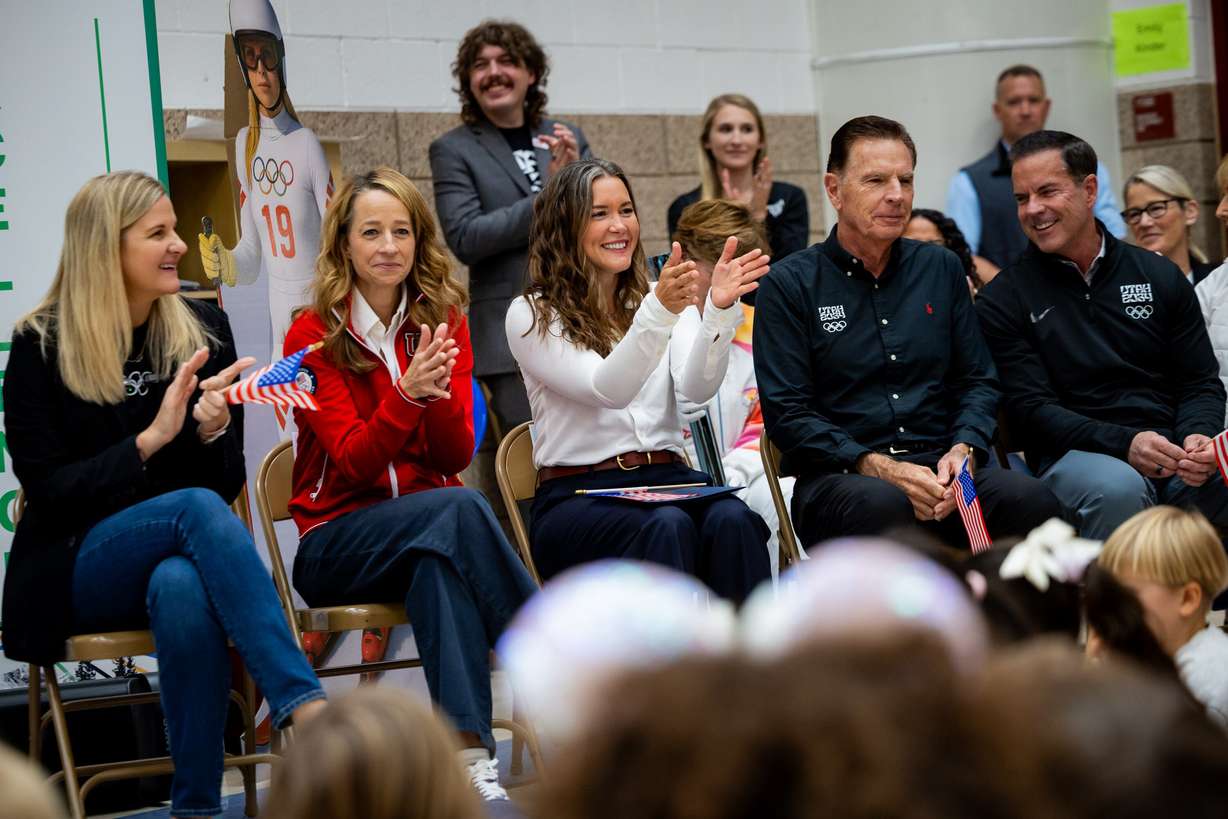 IOC President Kirsty Coventry, first lady Abby Cox, Salt Lake City Mayor Erin Mendenhall, Fraser Bullock, president and executive chair of the Utah 2034 organizing committee, and Brad Wilson, CEO and vice chair of the Utah 2034 organizing committee, participate in an Olympic-style opening ceremony celebrating Washington Elementary’s participation in Champion Schools 34, Utah 2034's statewide education initiative from Ken Garff for Good, at Washington Elementary School in Salt Lake City on Wednesday.