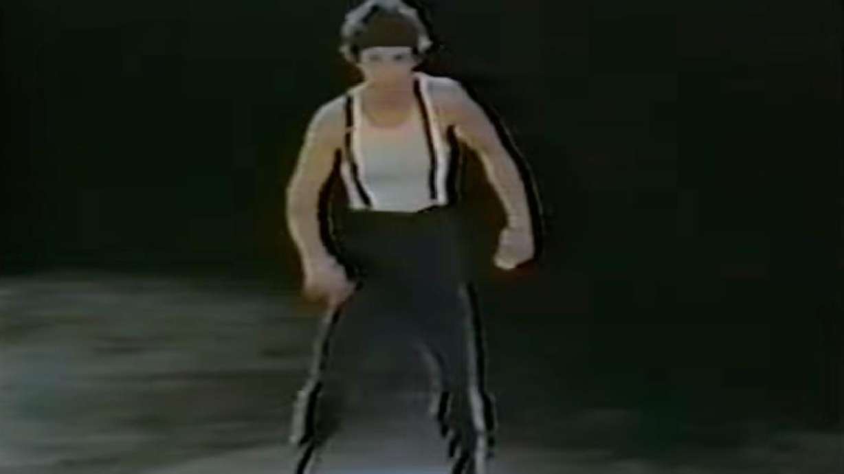 One take from a series of film showing what appears to be the original "Dancing in the Dark" music video idea.