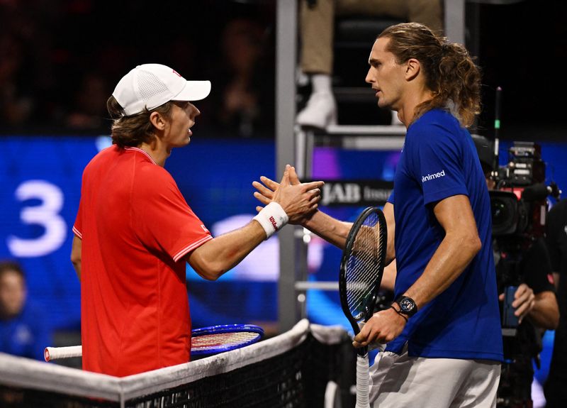 Tennis - Laver Cup - O2 Arena, London, Britain - September 26, 2026 Team World's Alex de Minaur shakes hands with Team Europe's Alexander Zverev after winning their singles match