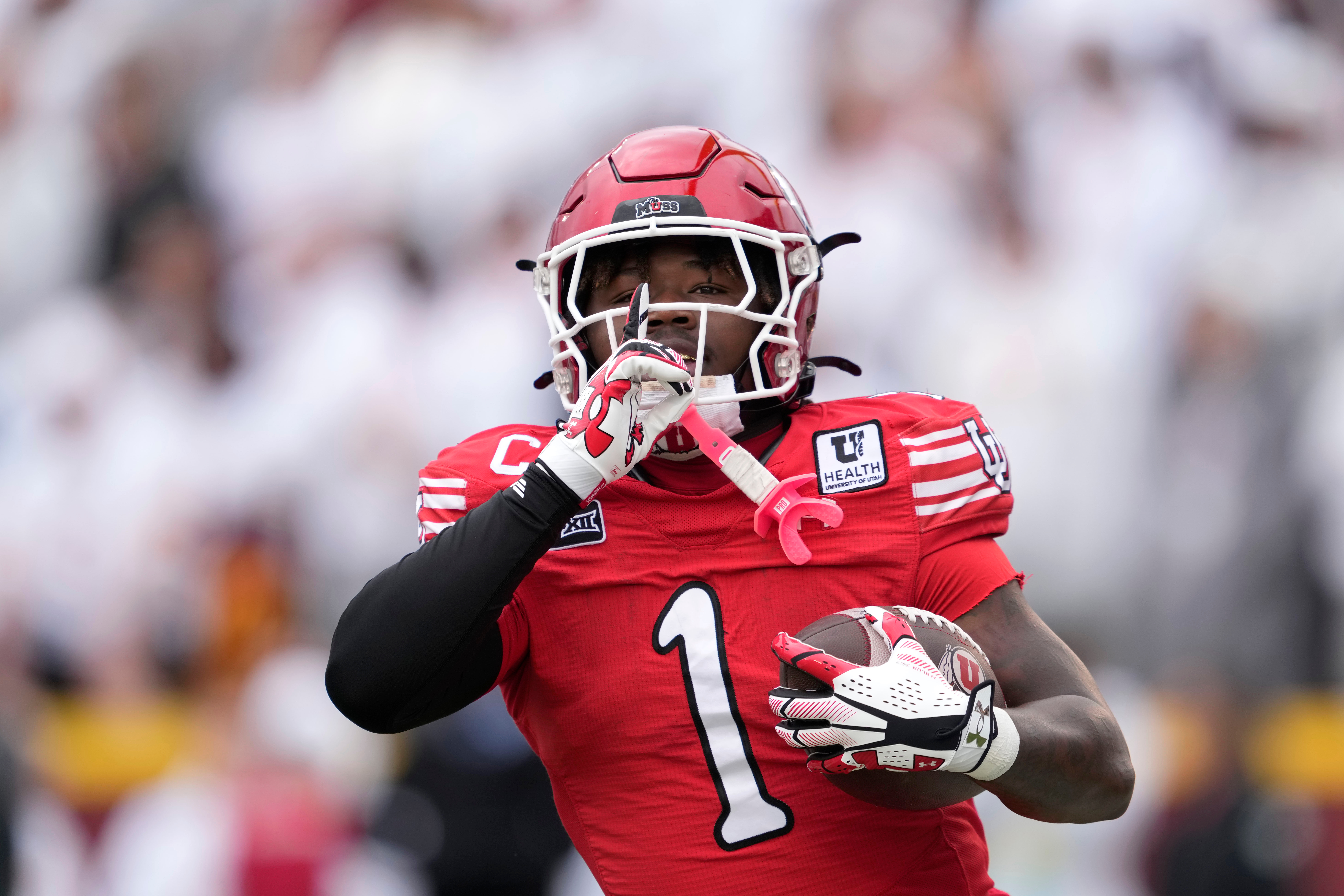 Wayshawn Parker has 3 TDs as No. 15 Utah holds on to defeat Iowa State