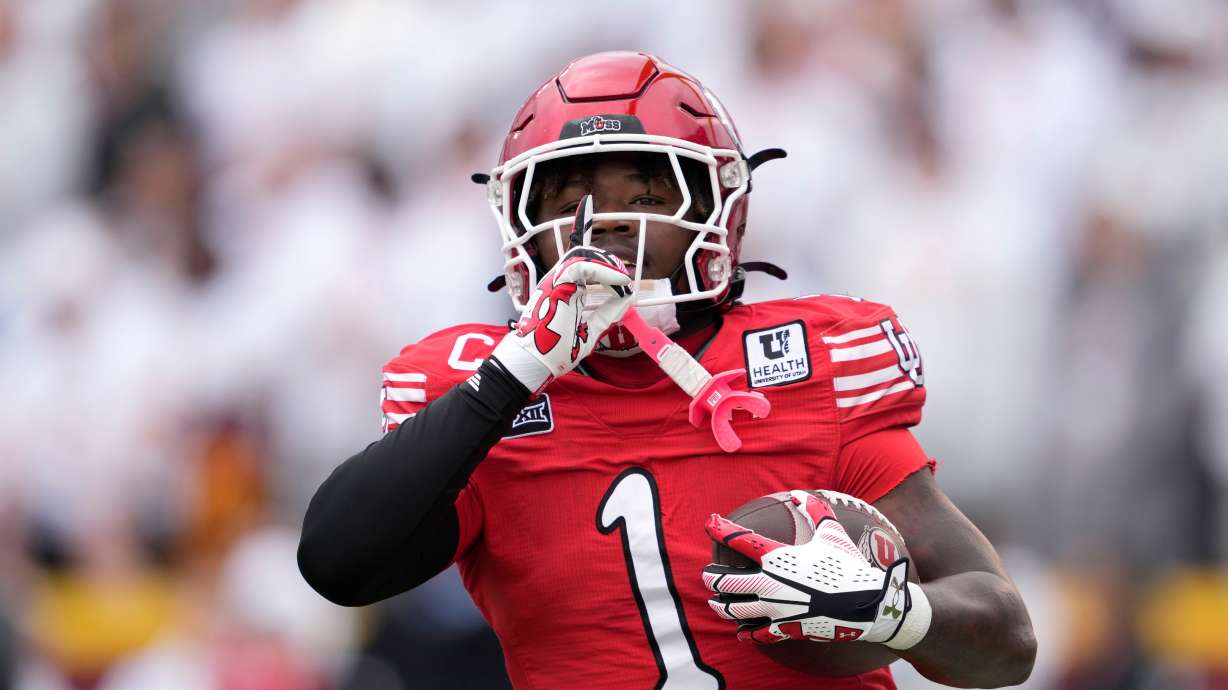 Utah running back Wayshawn Parker celebrates after scoring a touchdown during the first half of an NCAA college football game against Iowa State, Saturday, Sept. 26, 2026, in Ames, Iowa.