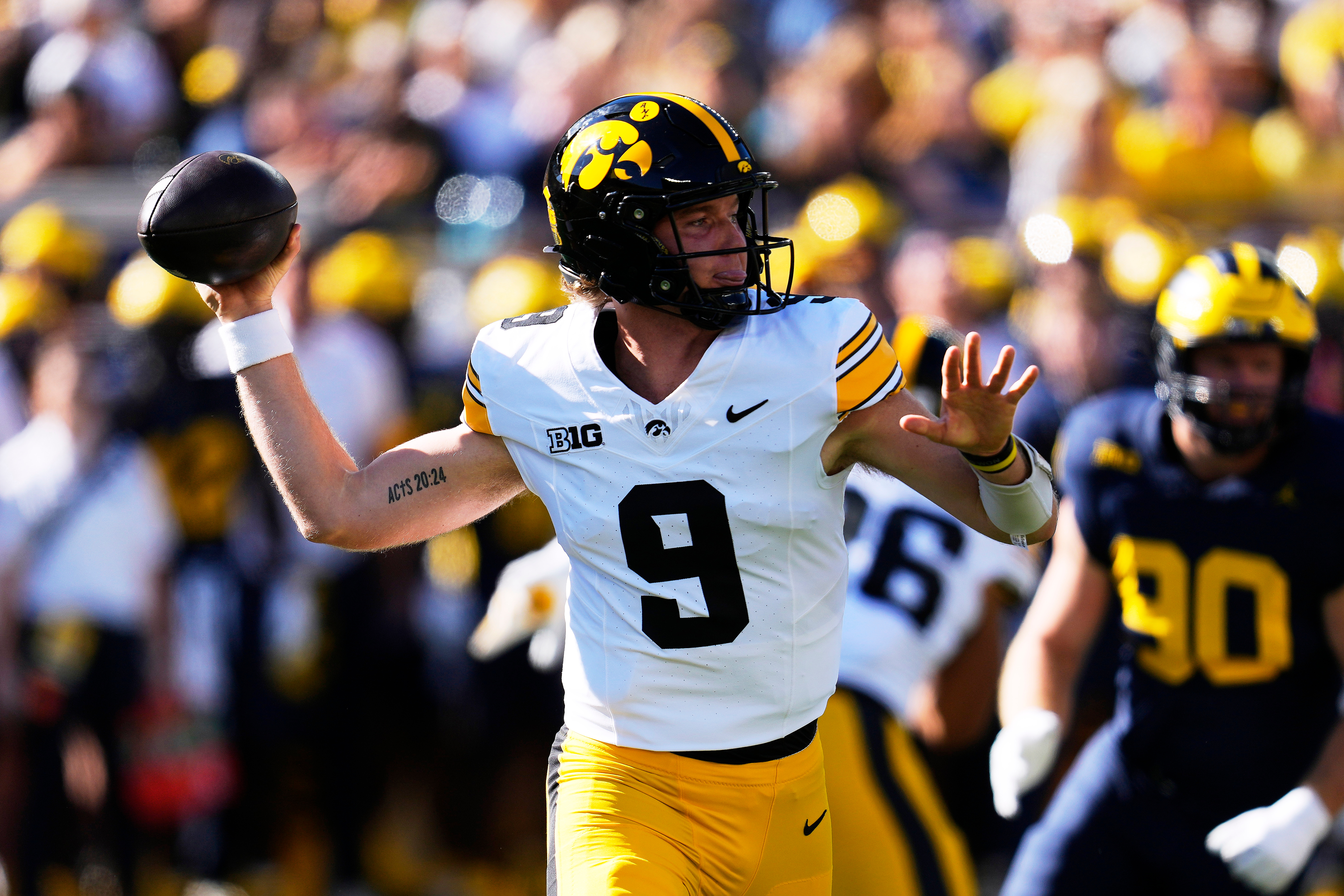 Iowa quarterback Hank Brown (9) throws against Michigan during the first half of an NCAA college football game in Ann Arbor, Mich., Saturday, Sept. 26, 2026. 