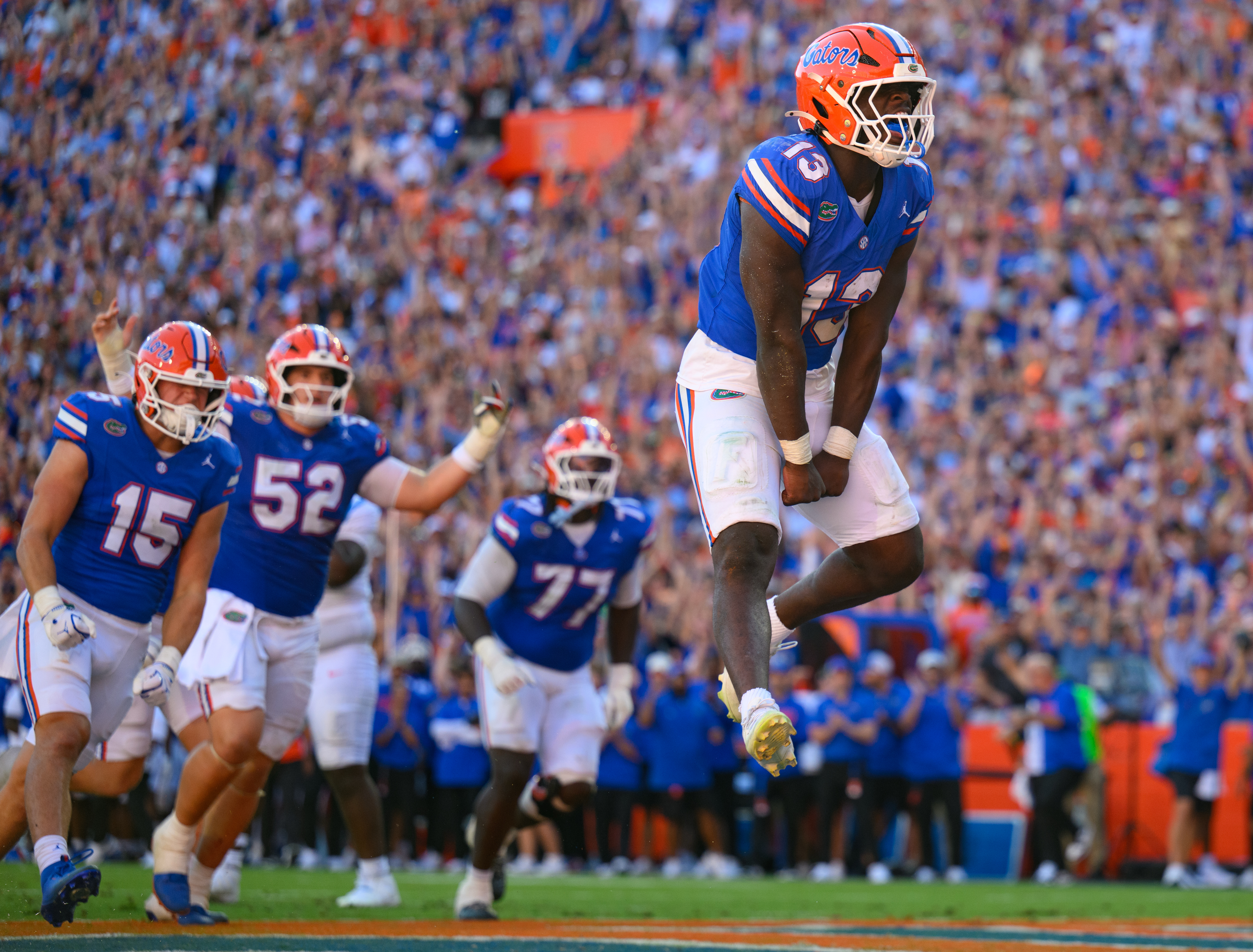 Florida running back Jadan Baugh (13) jumps in celebration after rushing for a touchdown during the first half of an NCAA college football game against Mississippi, Saturday, Sept. 26, 2026, in Gainesville, Fla. 
