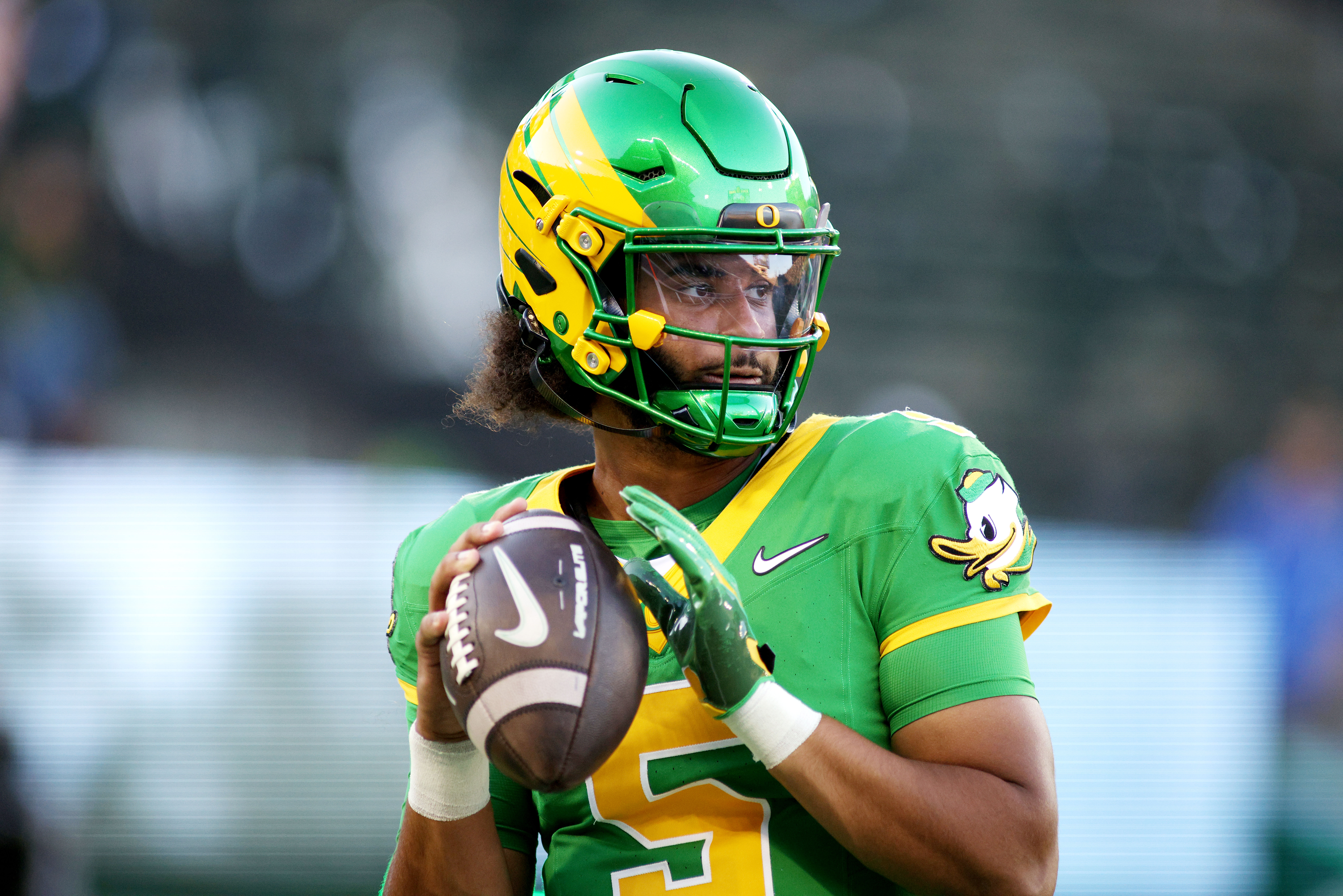 Oregon quarterback Dante Moore warms up before an NCAA college football game against Portland State, Friday, Sept. 18, 2026, in Eugene, Ore. 