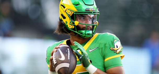 Oregon QB Dante Moore leaves field on cart, in neck brace after late hit from USC's Desman Stephens
