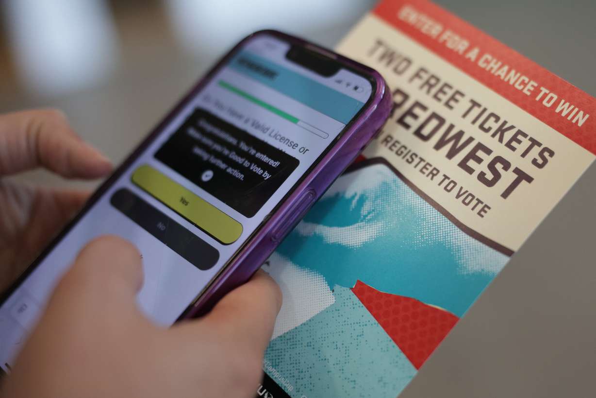 Utah Valley University master’s student Rebecca Whyte checks her voter registration status as part of a statewide challenge sponsored by the lieutenant governor’s office, Wednesday, in Orem.