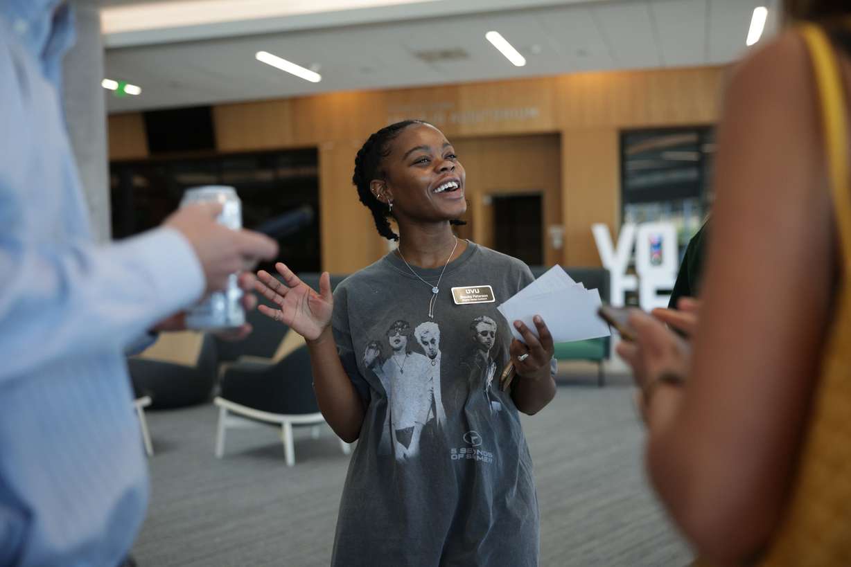Utah Valley University junior Brooke Peterson of the Herbert Institute for Public Policy talks to other students about voter registration as part of a statewide challenge sponsored by the lieutenant governor’s office, Wednesday, in Orem.