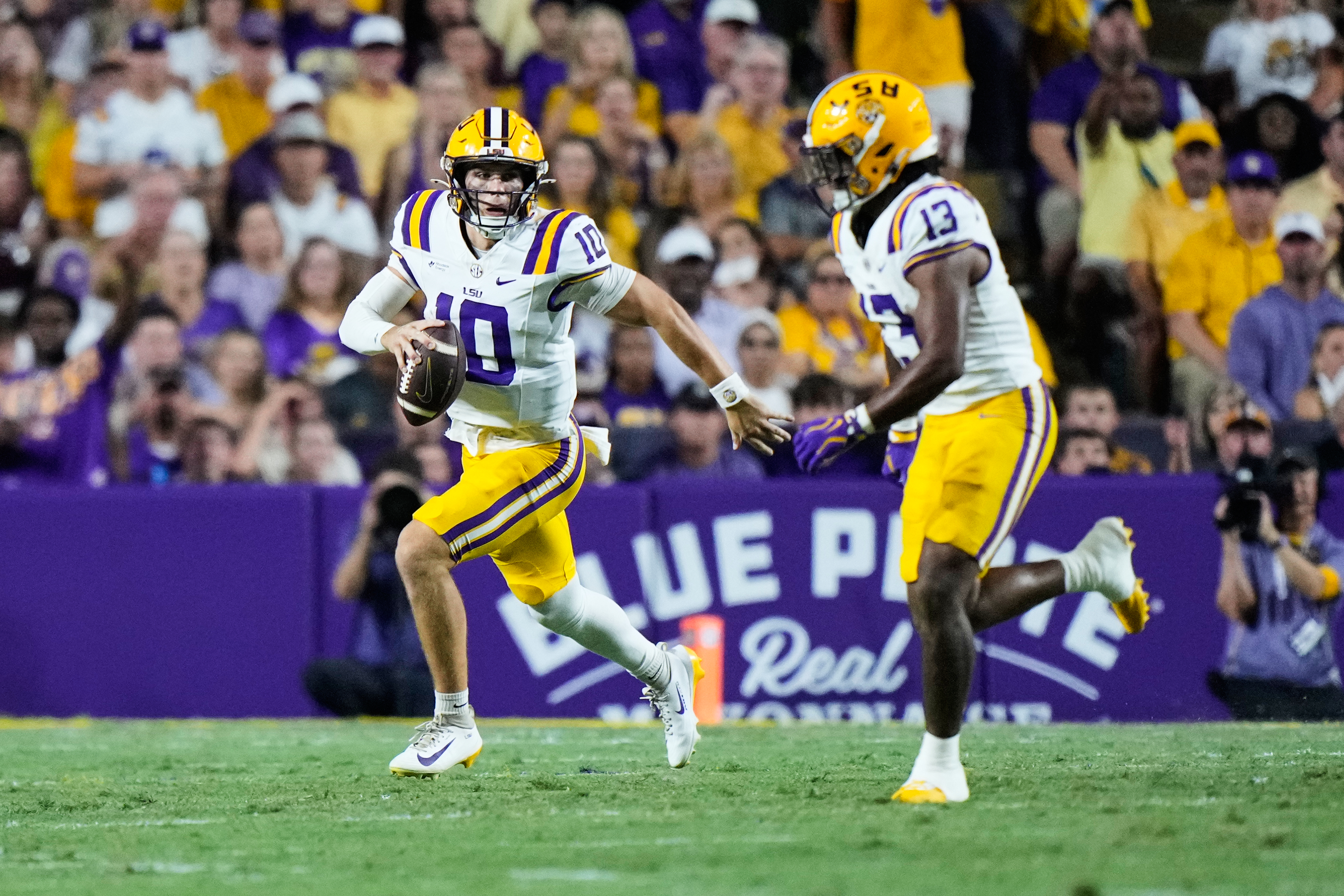 LSU quarterback Sam Leavitt (10) carries against Texas A&M in the first half of an NCAA college football game against LSU, Saturday, Sept. 26, 2026 in Baton Rouge, La.