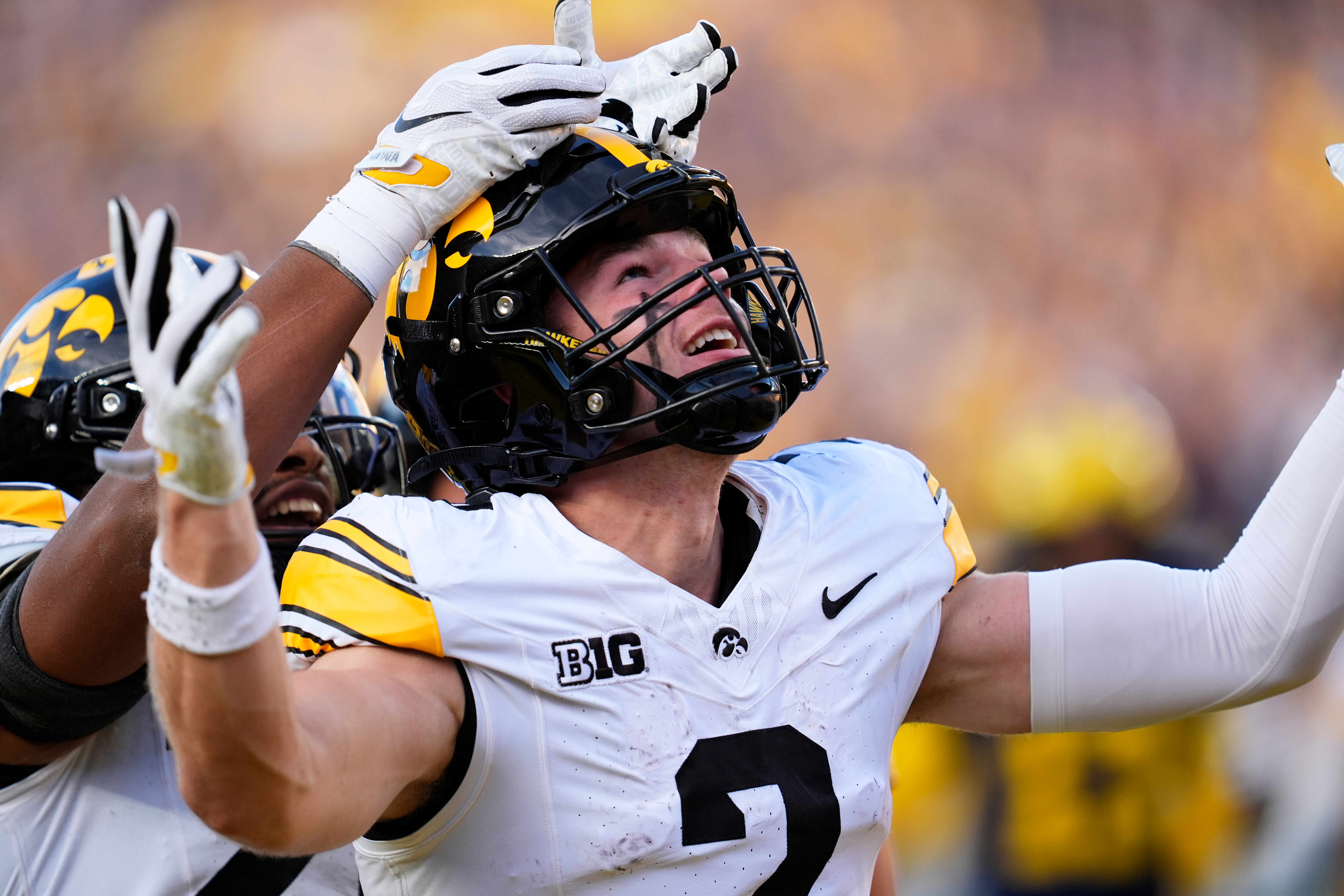 Iowa wide receiver Reece Vander Zee (2) celebrates his 16-yard touchdown reception against Michigan during the second half of an NCAA college football game in Ann Arbor, Mich., Saturday, Sept. 26, 2026. 