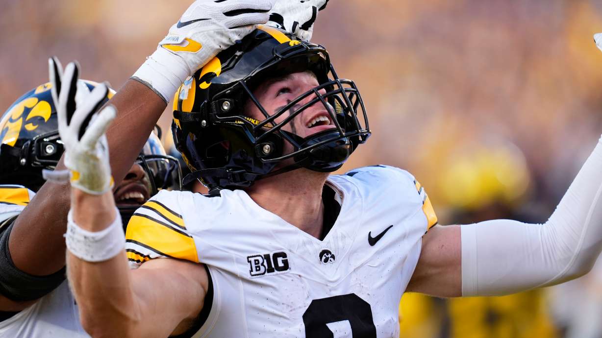 Iowa wide receiver Reece Vander Zee (2) celebrates his 16-yard touchdown reception against Michigan during the second half of an NCAA college football game in Ann Arbor, Mich., Saturday, Sept. 26, 2026.