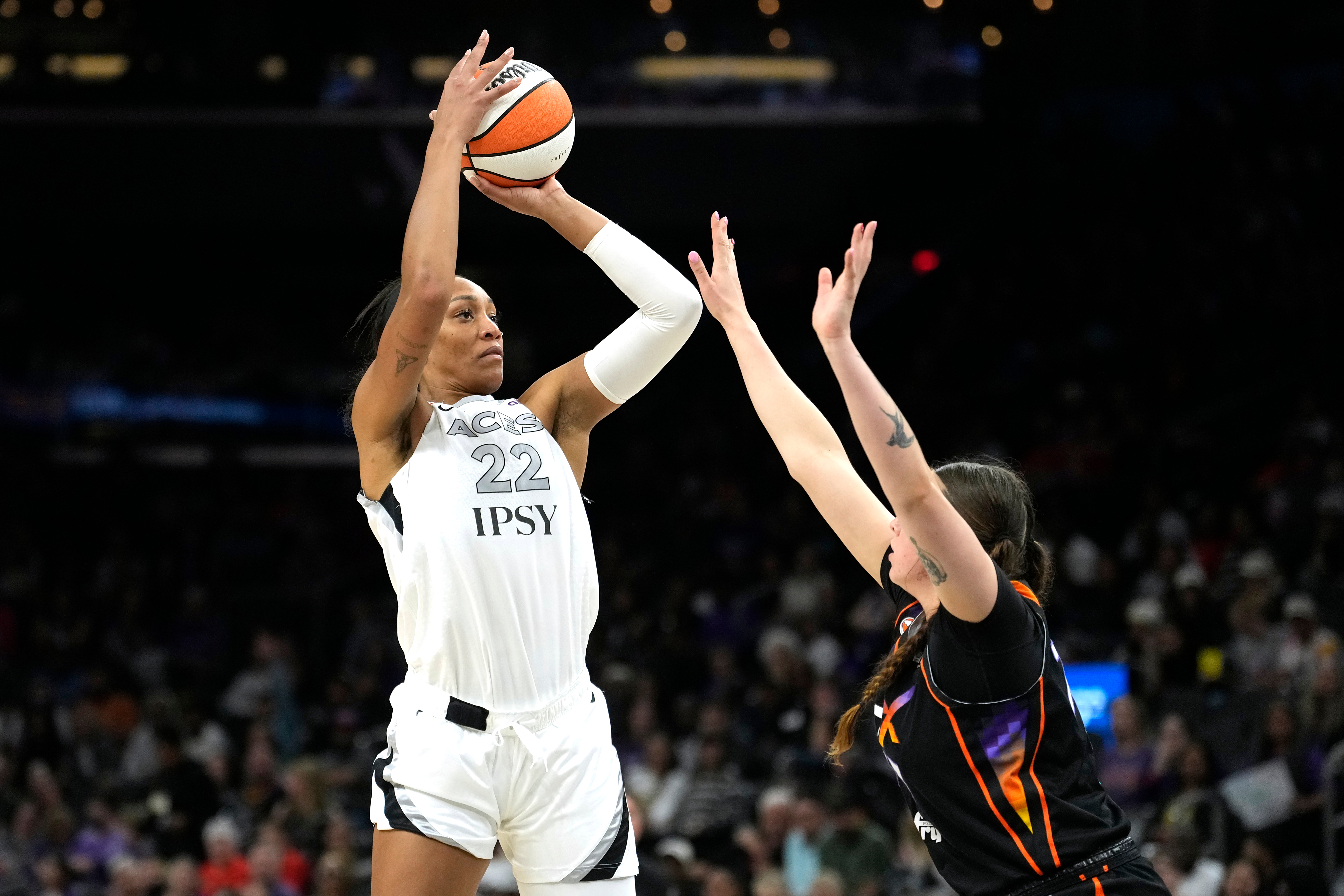 Las Vegas Aces center A'ja Wilson (22) shoots over Phoenix Mercury forward Marta Suarez during the second half of a WNBA basketball game, Thursday, Sept. 24, 2026, in Phoenix. 