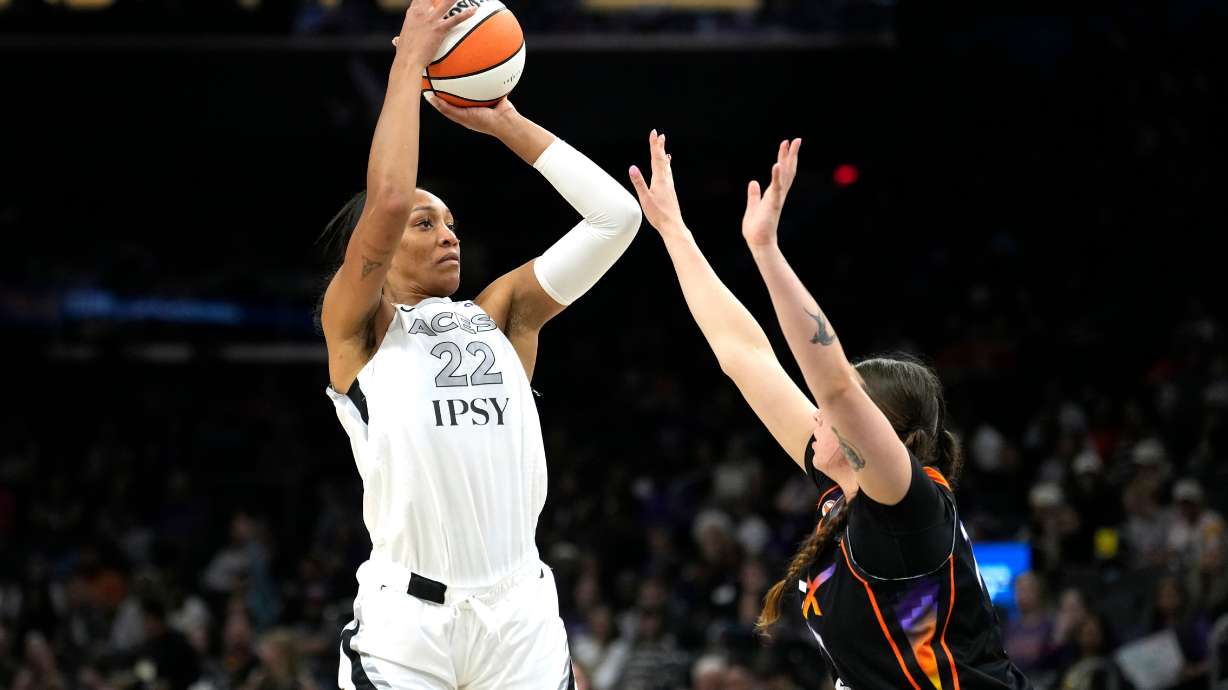 Las Vegas Aces center A'ja Wilson (22) shoots over Phoenix Mercury forward Marta Suarez during the second half of a WNBA basketball game, Thursday, Sept. 24, 2026, in Phoenix.