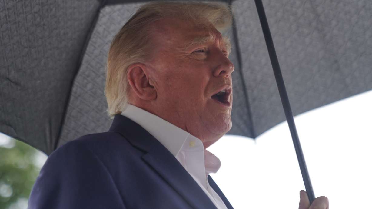 President Donald Trump talks to reporters on the South Lawn of the White House before boarding Marine One, Sunday, Sept. 27, 2026, in Washington.