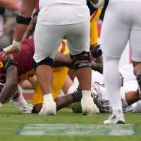 Oregon QB Moore sustained concussion on late hit; USC suspends LB Stephens for 1 game for hit