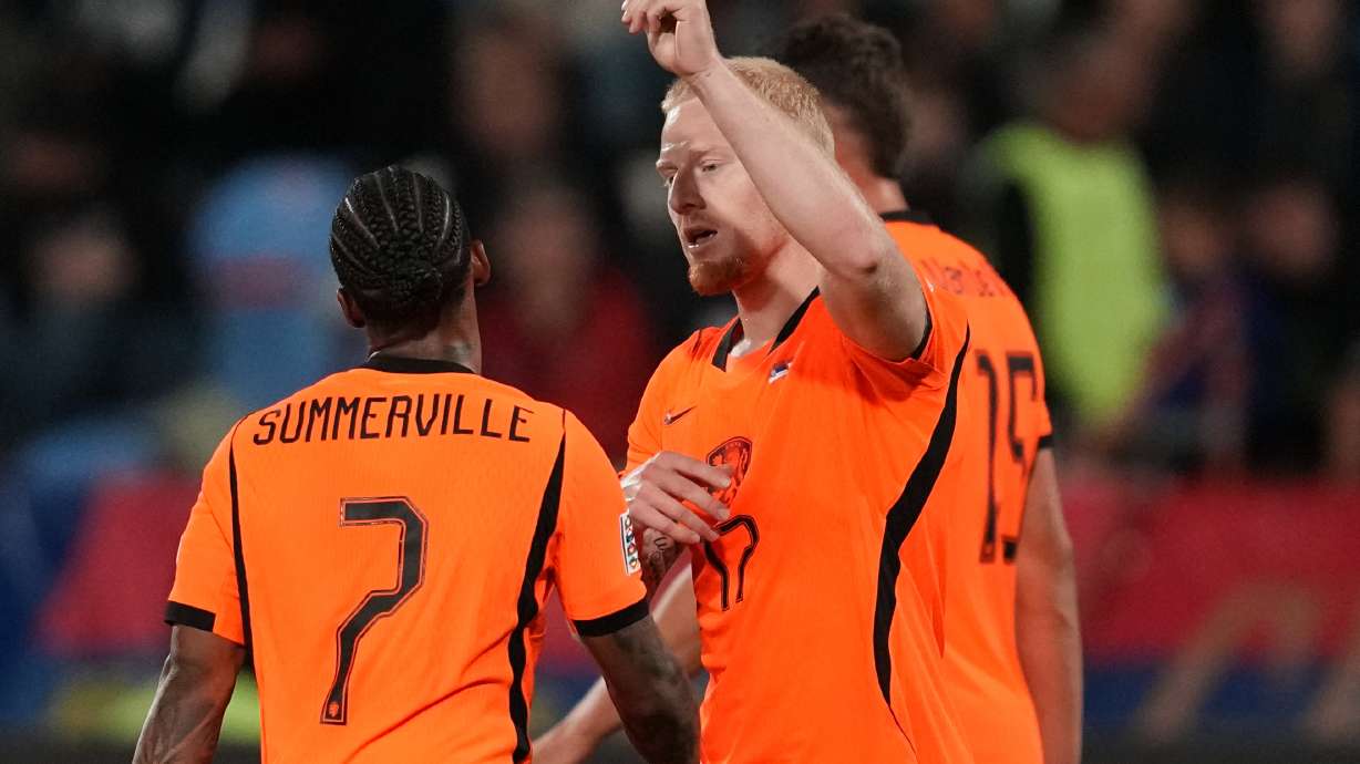 Netherlands' Mexx Meerdink celebrates with' Crysencio Summerville, left, after scoring his side's second goal during the Nations League soccer match between Serbia and the Netherlands in Belgrade, Serbia, Sunday, Sept. 27, 2026.