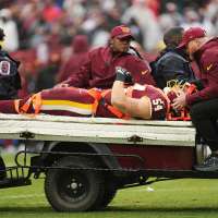 Washington LB Leo Chenal carted off with a neck injury against Seattle