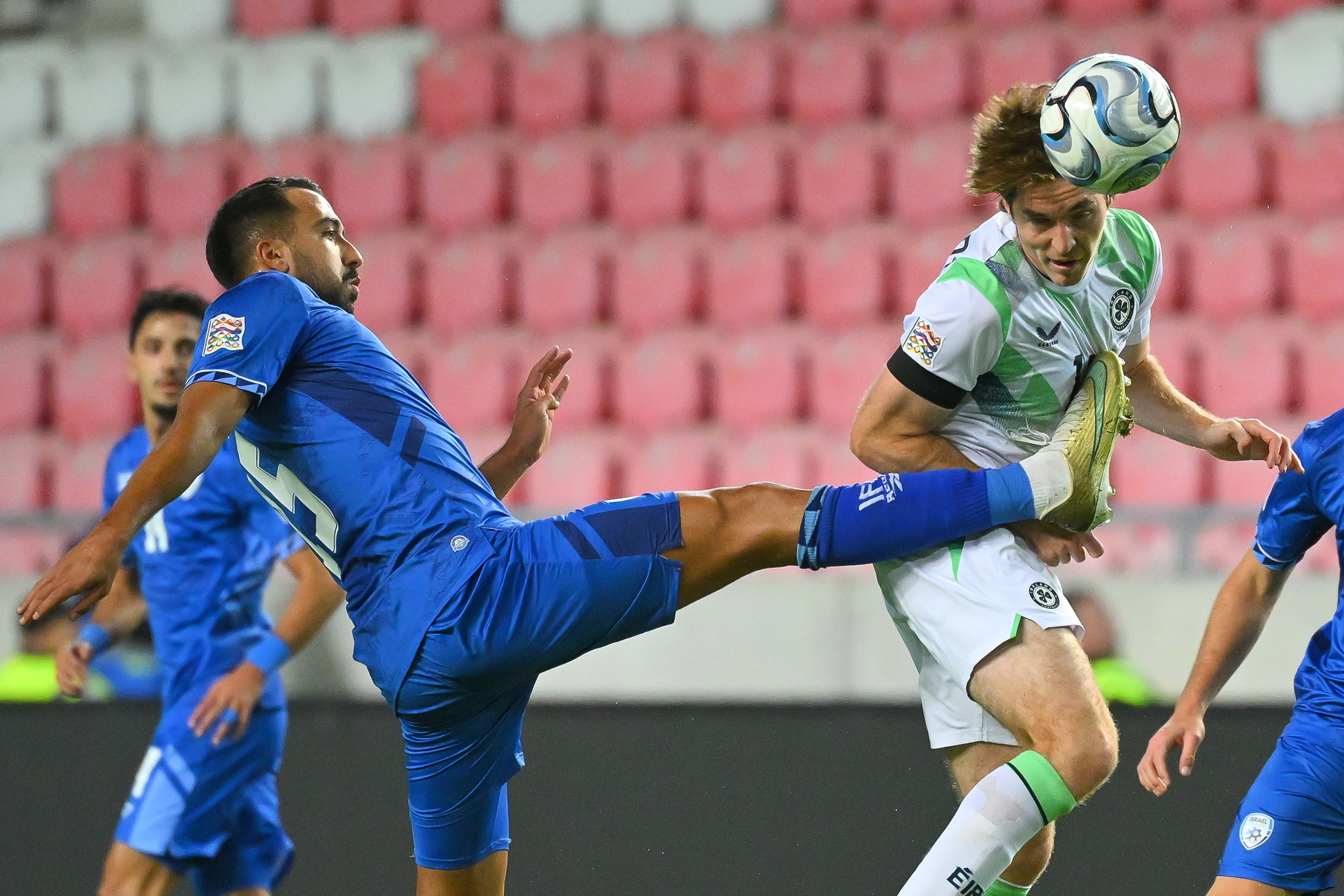 Eliel Peretz of Israel, left, in action against Conor Coventry of Ireland during the UEFA Nations League soccer match between Ireland and Israel in Debrecen, Hungary, Sunday, Sept. 27, 2026. 