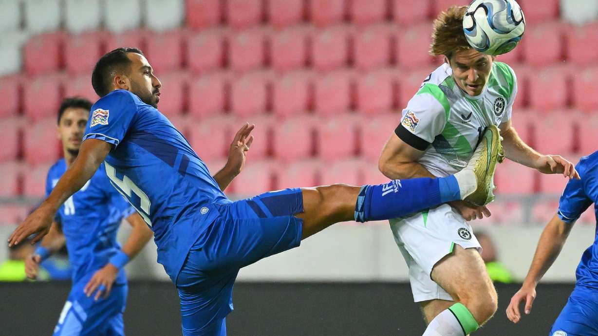 Eliel Peretz of Israel, left, in action against Conor Coventry of Ireland during the UEFA Nations League soccer match between Ireland and Israel in Debrecen, Hungary, Sunday, Sept. 27, 2026.