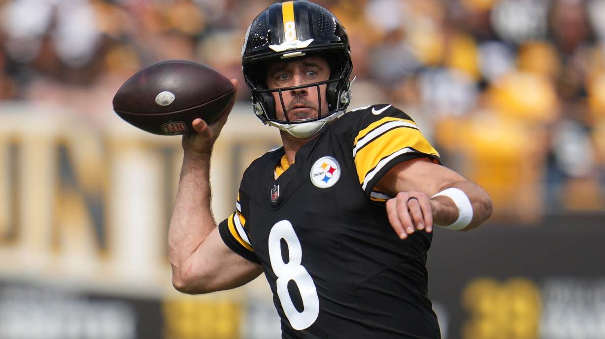 Pittsburgh Steelers quarterback Aaron Rodgers throws a pass during the first half of an NFL football game against the Cincinnati Bengals in Pittsburgh, Sunday, Sept. 27, 2026.