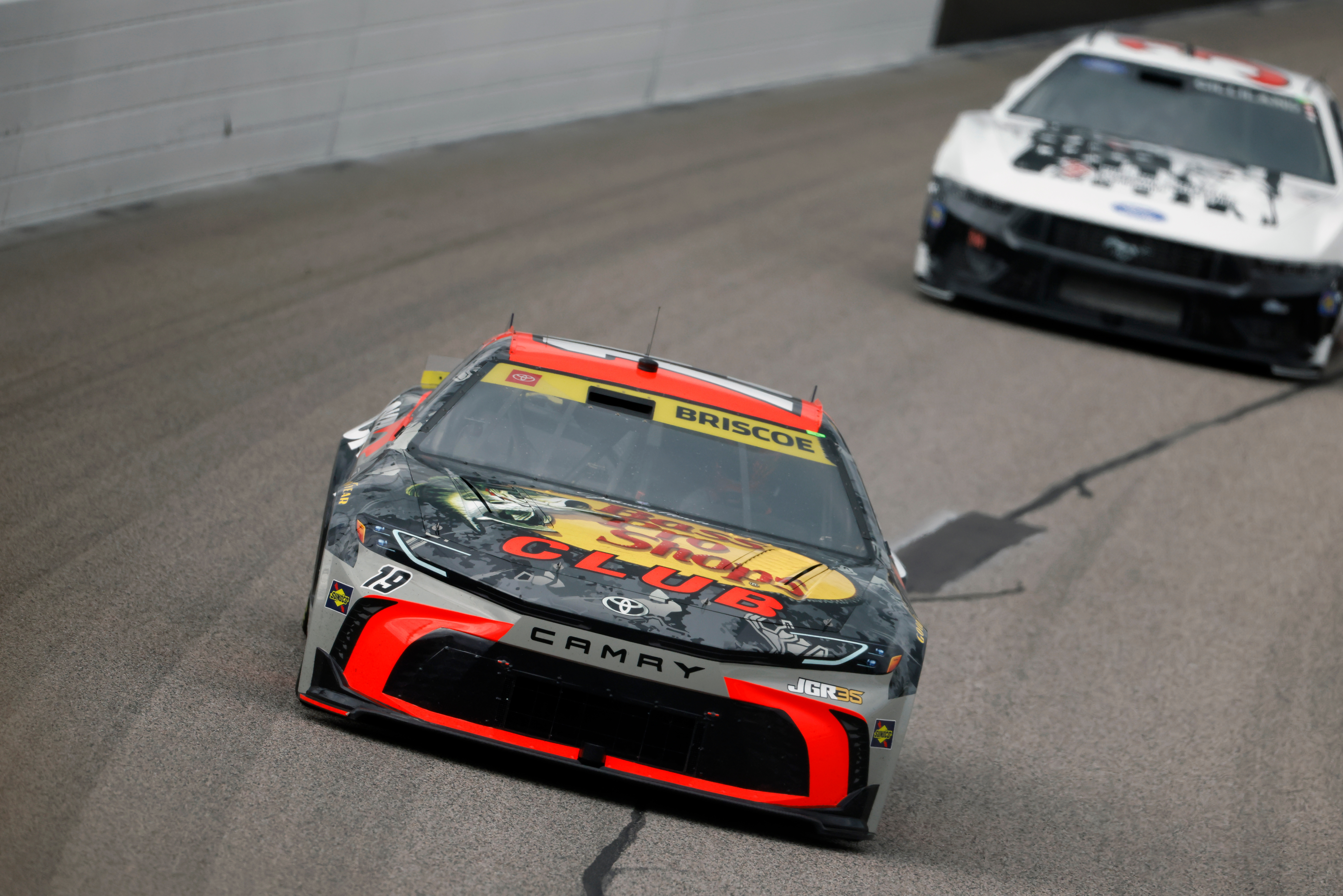Chase Briscoe (19) heads through Turn 1 during a NASCAR Cup Series auto race in Kansas City, Kan., Sunday, Sept. 27, 2026. 