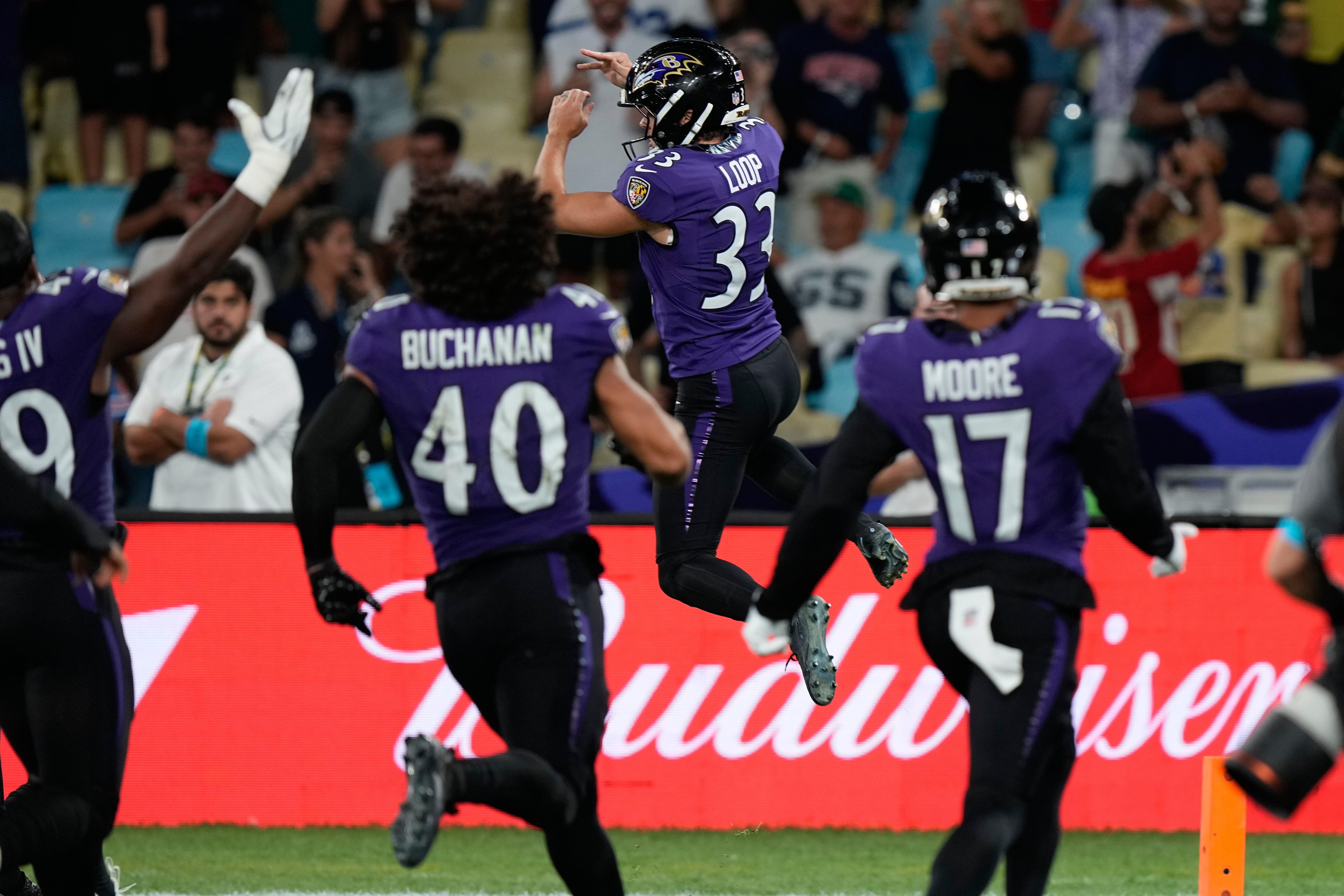 Baltimore Ravens place kicker Tyler Loop (33) celebrates after a game-winning field goal during the second half of an NFL football game against the Dallas Cowboys in Rio de Janeiro, Sunday, Sept. 27, 2026. 