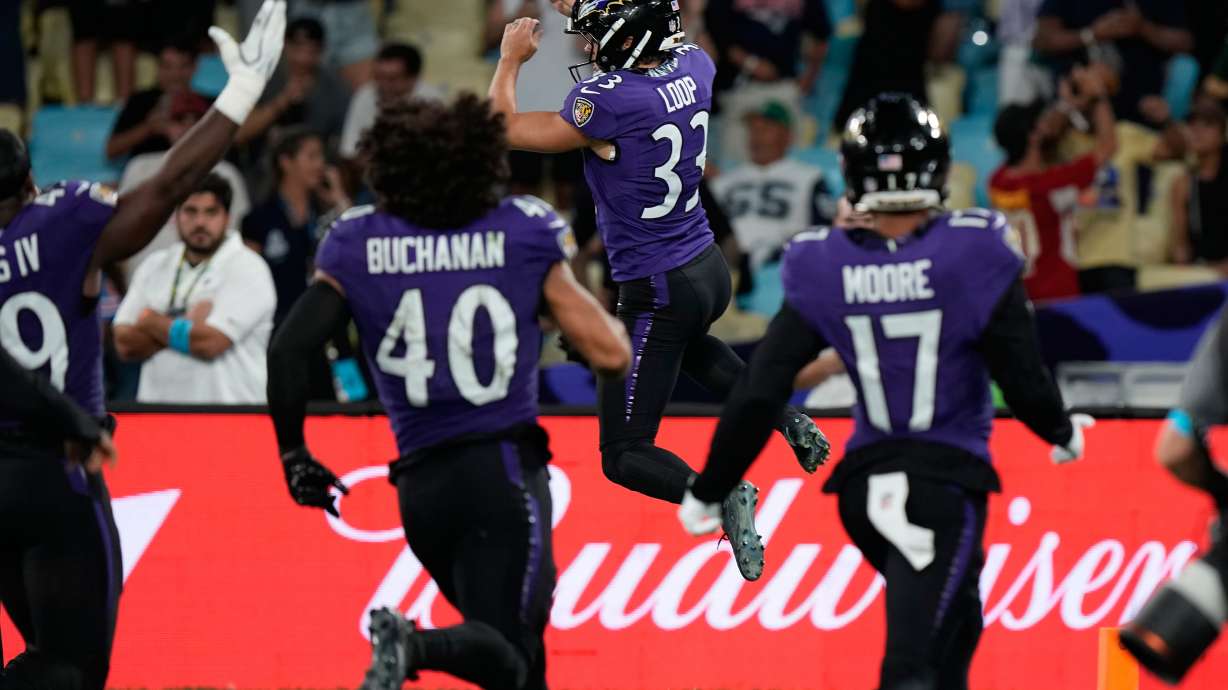 Baltimore Ravens place kicker Tyler Loop (33) celebrates after a game-winning field goal during the second half of an NFL football game against the Dallas Cowboys in Rio de Janeiro, Sunday, Sept. 27, 2026.