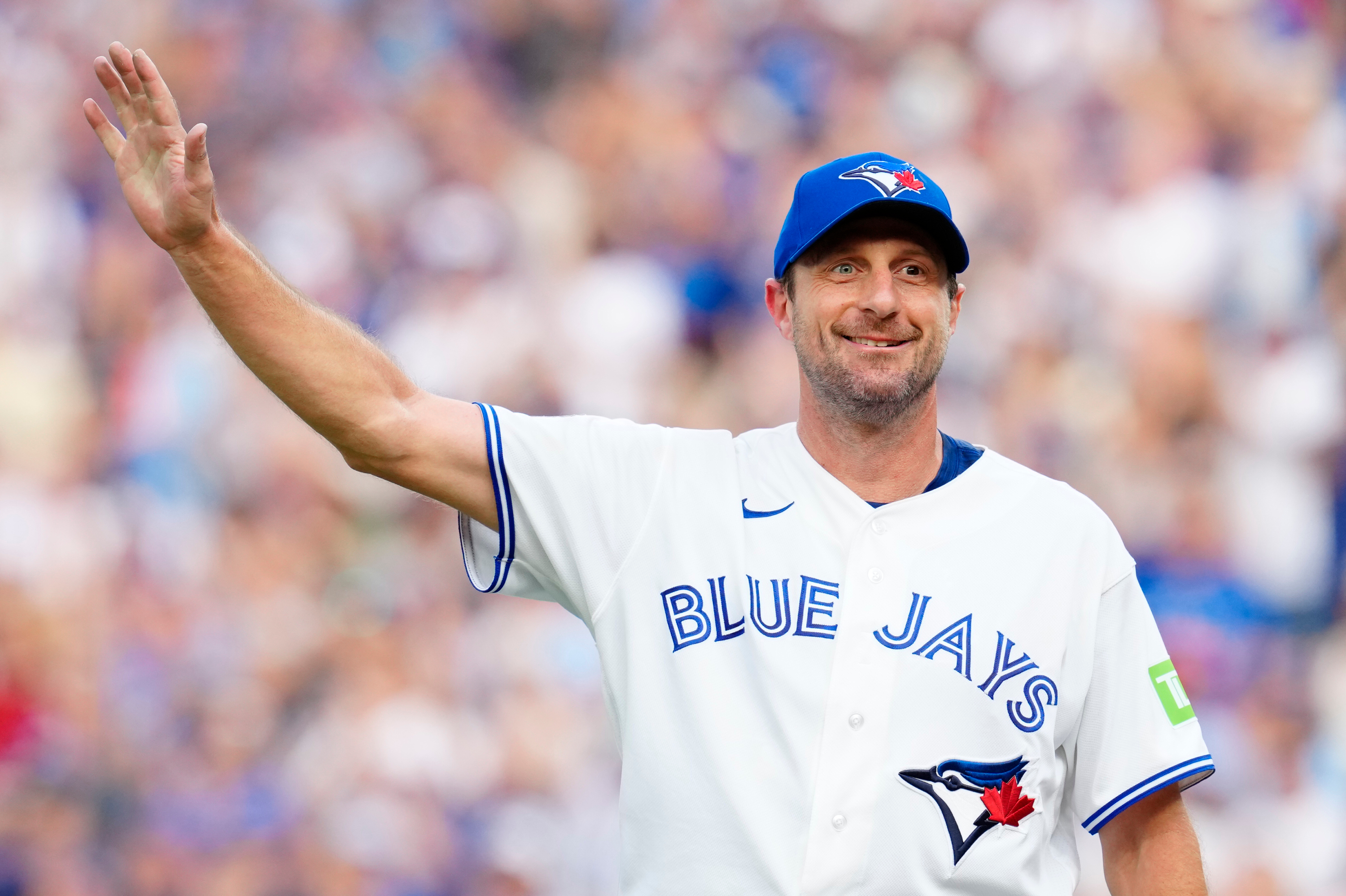 Toronto Blue Jays pitcher Max Scherzer (31) reacts to fans after he was pulled from the game against the Cincinnati Reds during eighth inning MLB baseball action in Toronto on Sunday, Sept. 27, 2026. 