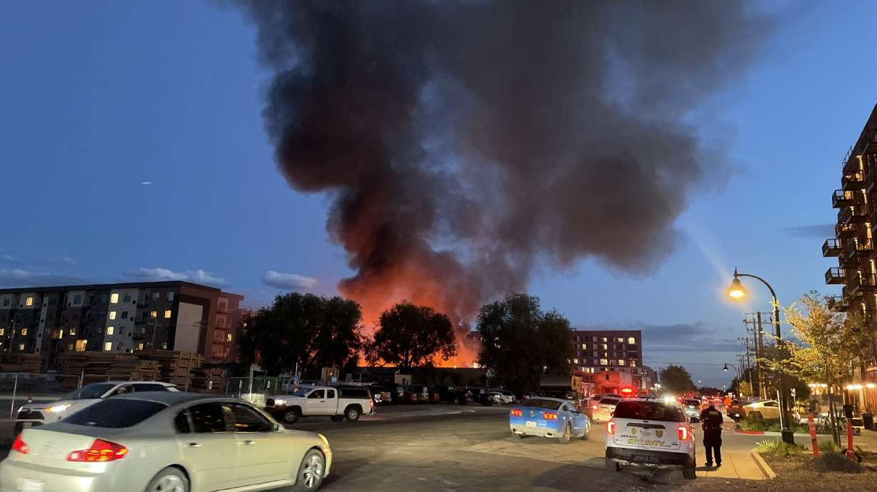 A large structure fire is pictured in downtown Salt Lake City.