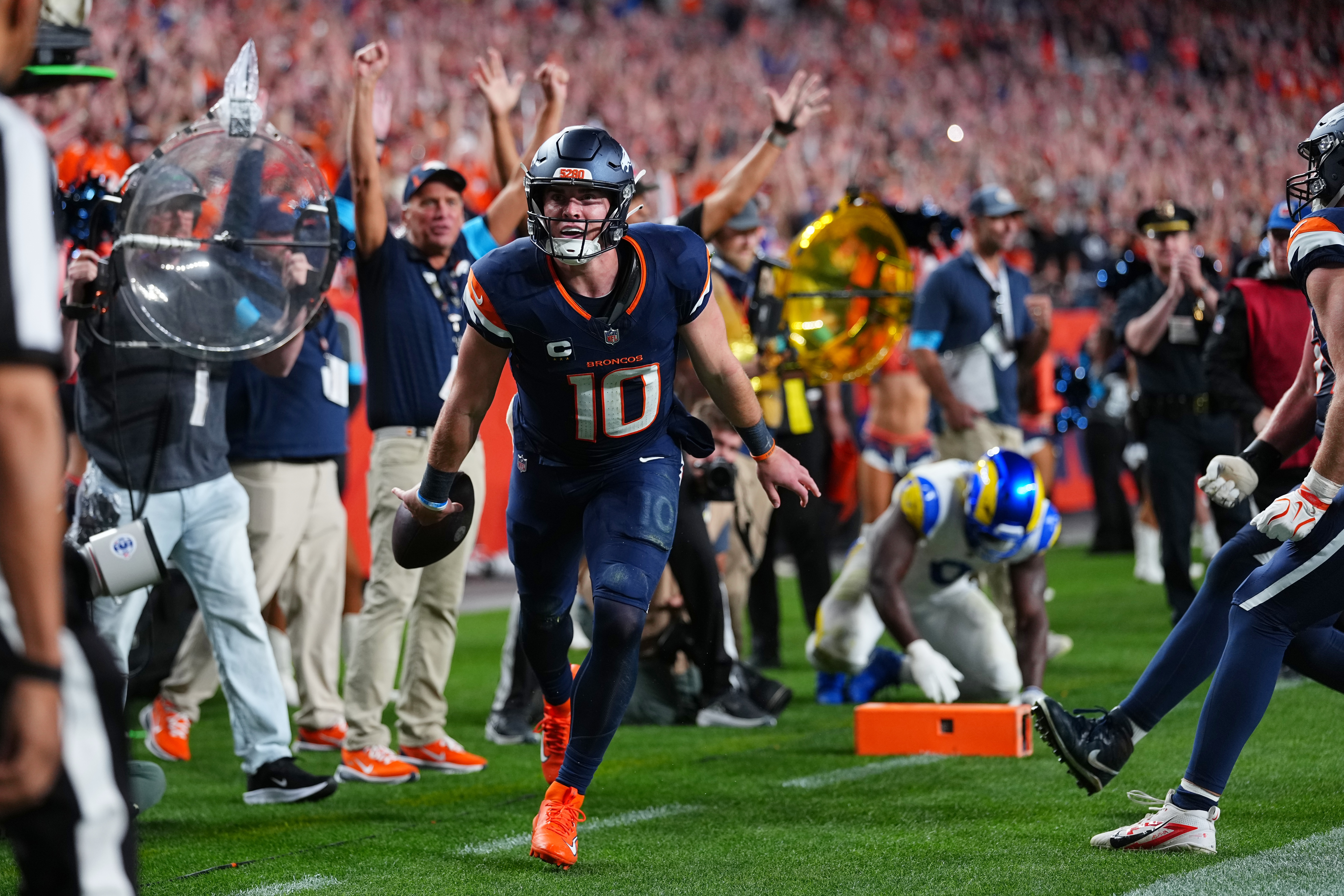 Bo Nix and Talanoa Hufanga lead the Broncos past the Rams 30-26 in a Sunday night thriller