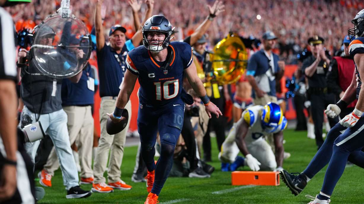 Denver Broncos quarterback Bo Nix reacts after a play against the Los Angeles Rams during the second half of an NFL football game Sunday, Sept. 27, 2026, in Denver.