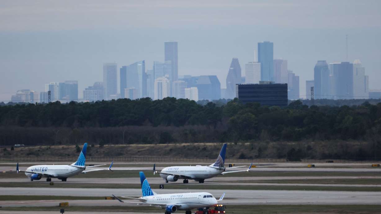 Planes line up to depart from George Bush Intercontinental Airport (IAH) in Houston, Texas, on December 29, 2025.