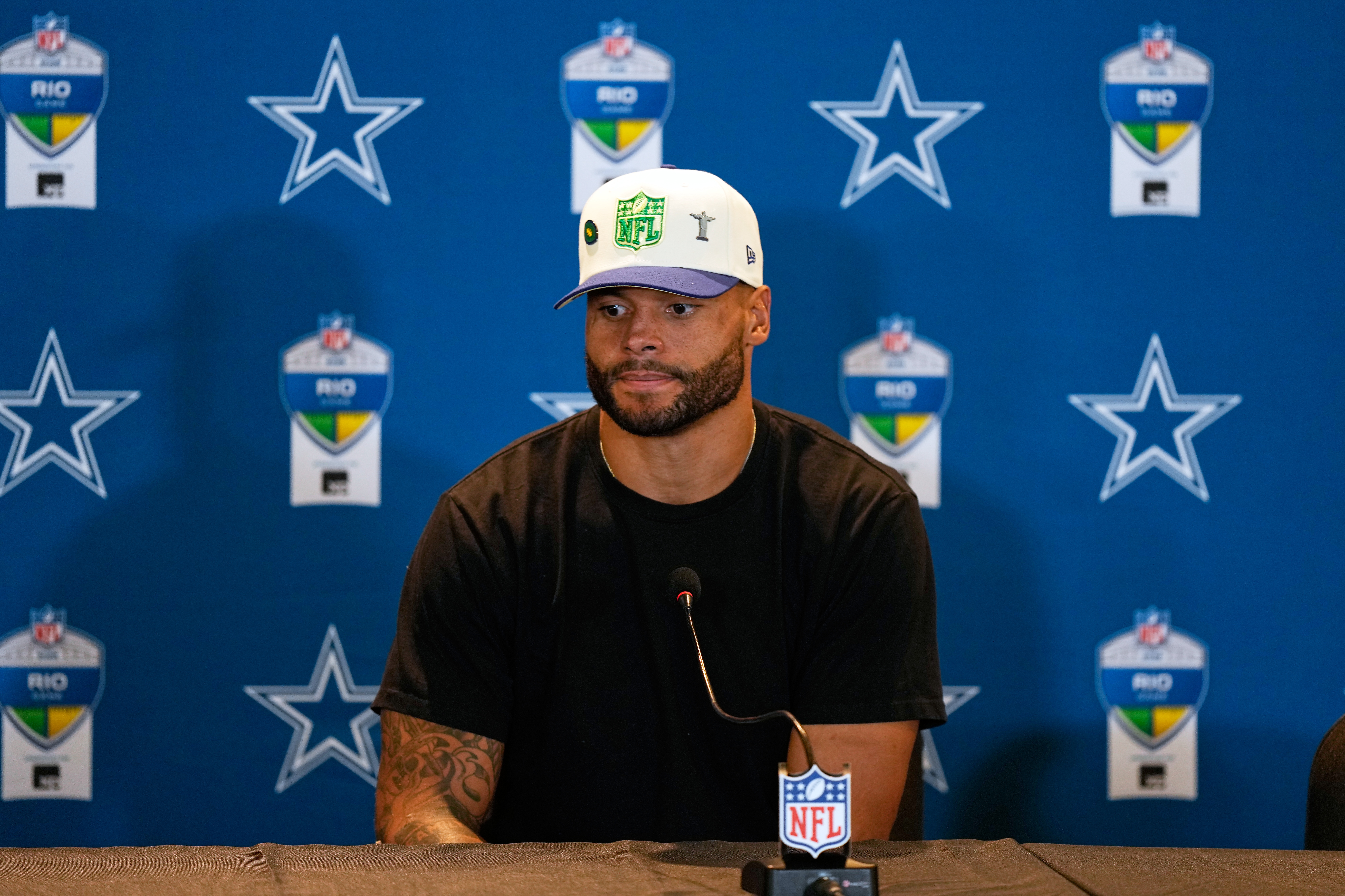 Dallas Cowboys quarterback Dak Prescott speaks during a press conference after an NFL football game against the Baltimore Ravens in Rio de Janeiro, Sunday, Sept. 27, 2026. 