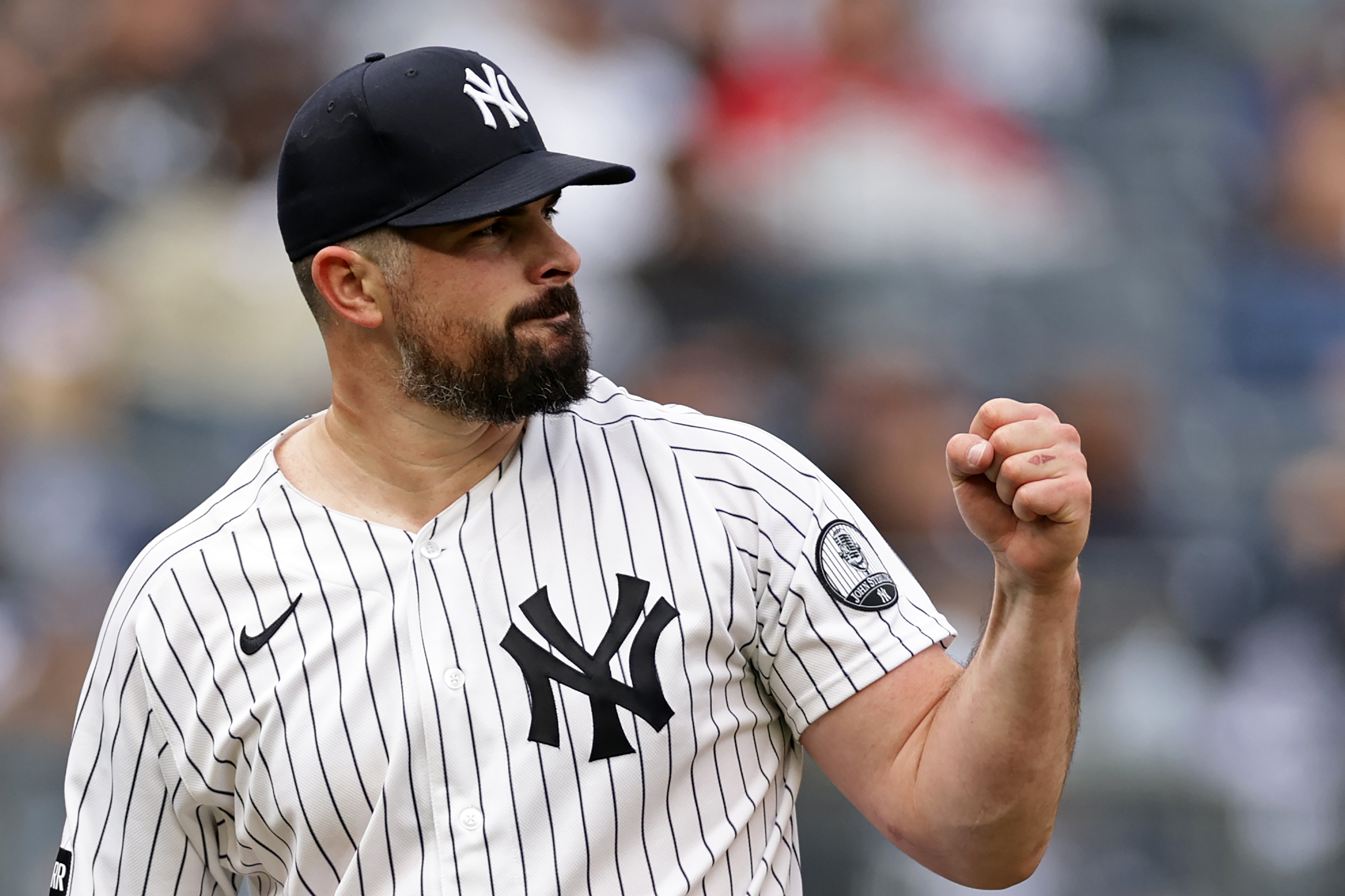 New York Yankees pitcher Carlos Rodon reacts after the final out in the top half of the seventh inning during the first baseball game of a doubleheader against the Tampa Bay Rays, Tuesday, Sept. 22, 2026, in New York. 