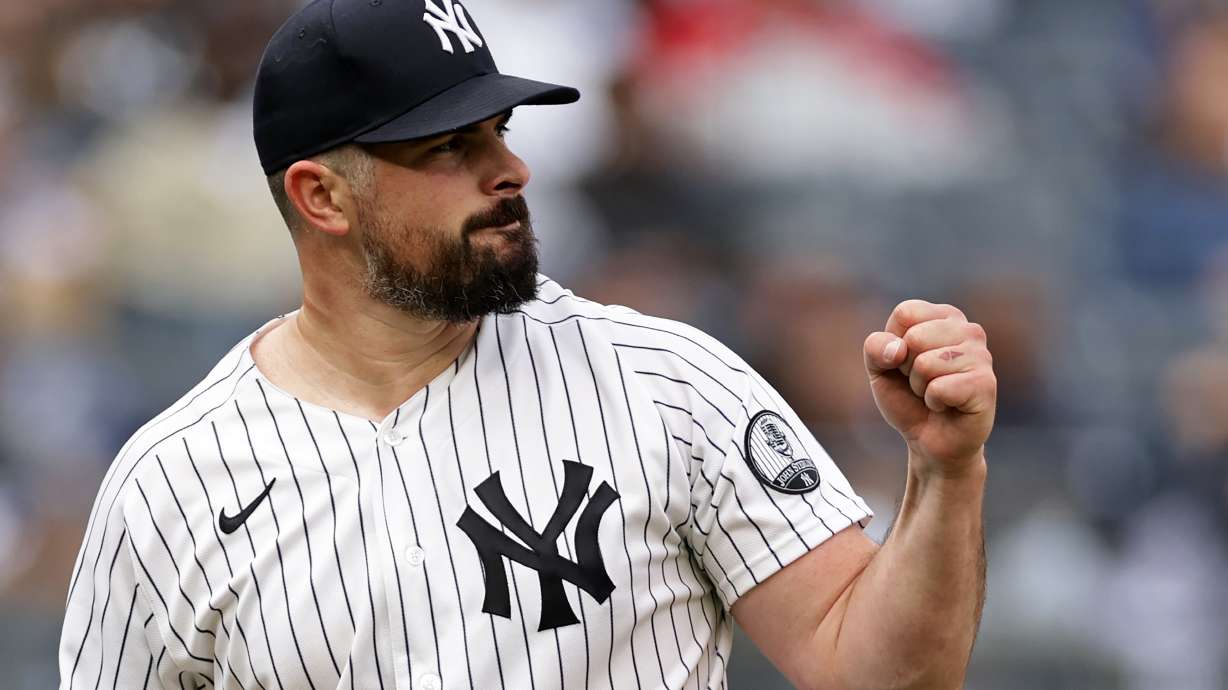 New York Yankees pitcher Carlos Rodon reacts after the final out in the top half of the seventh inning during the first baseball game of a doubleheader against the Tampa Bay Rays, Tuesday, Sept. 22, 2026, in New York.