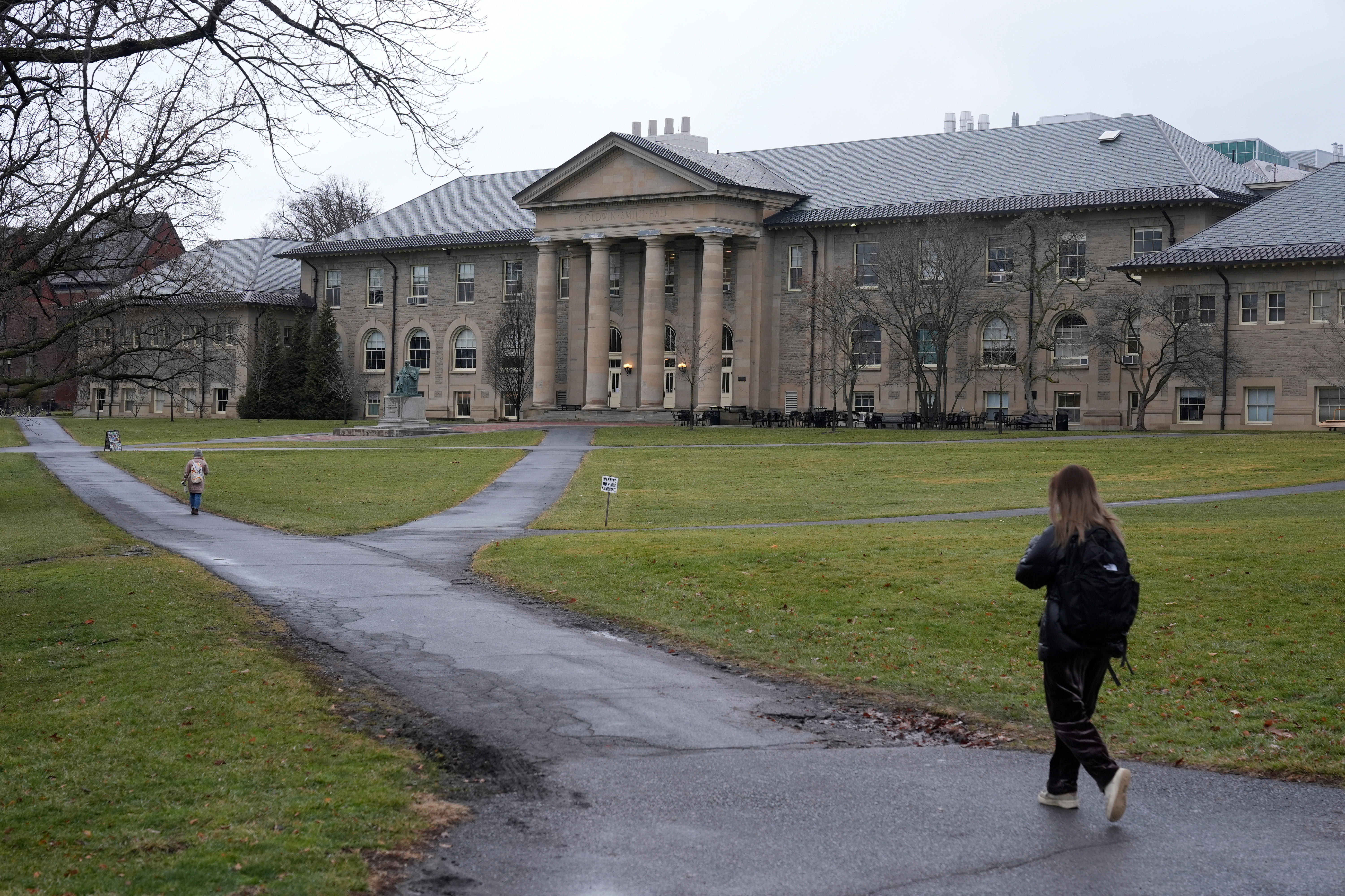 People walk on the campus of Cornell University in Ithaca, N.Y., Feb. 2, 2024. 