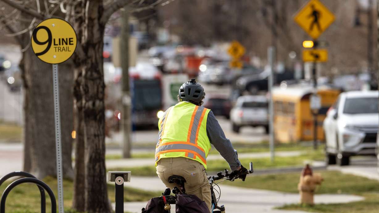 A cyclist bikes along the 9 Line Trail on 900 South in Salt Lake City on March 4.