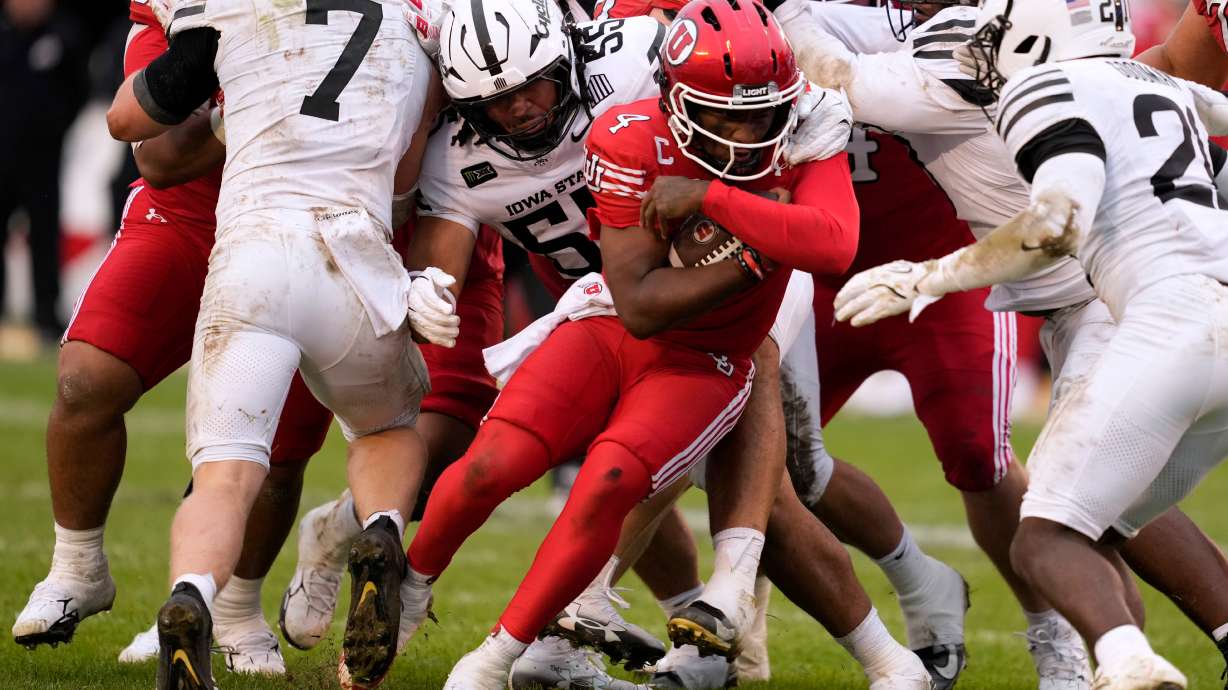 Utah quarterback Devon Dampier (4) is tackled by Iowa State defensive end Jace Gilbert (55) during the second half of an NCAA college football game, Saturday, Sept. 26, 2026, in Ames, Iowa.