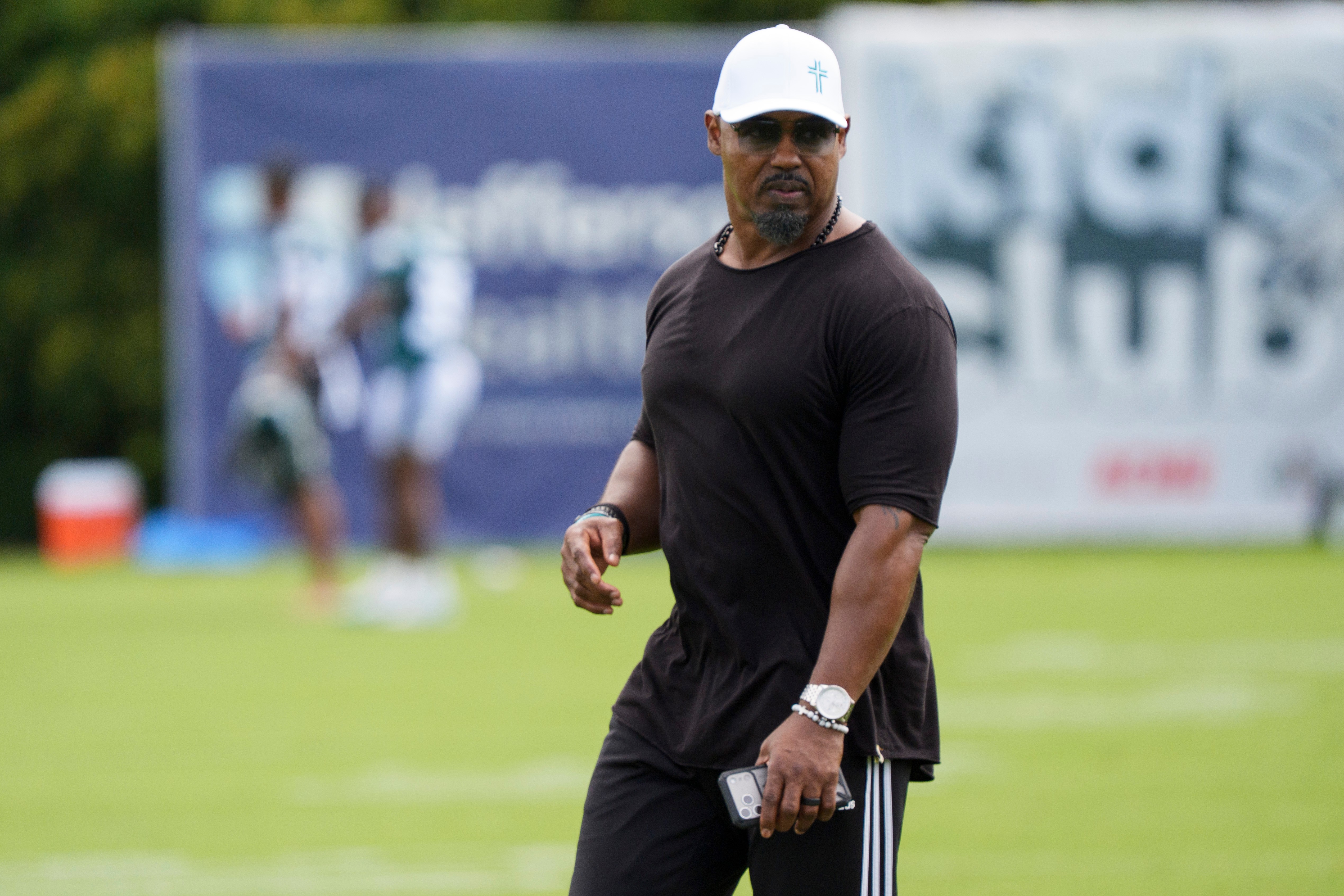 FILE - Former Philadelphia Eagles' Brian Dawkins looks on during practice at NFL football training camp at the team's training facility in Philadelphia, July 30, 2026. 