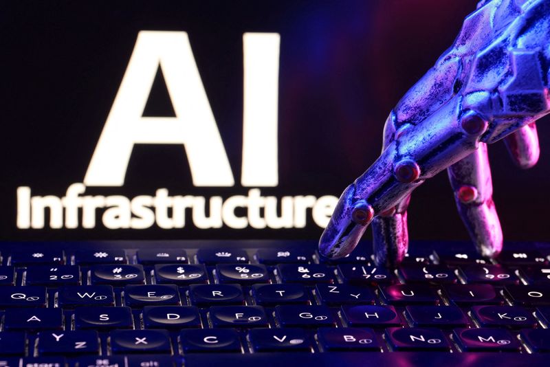 The words "AI Infrastructure", a keyboard and a robotic hand in this illustration taken September 23, 2026.