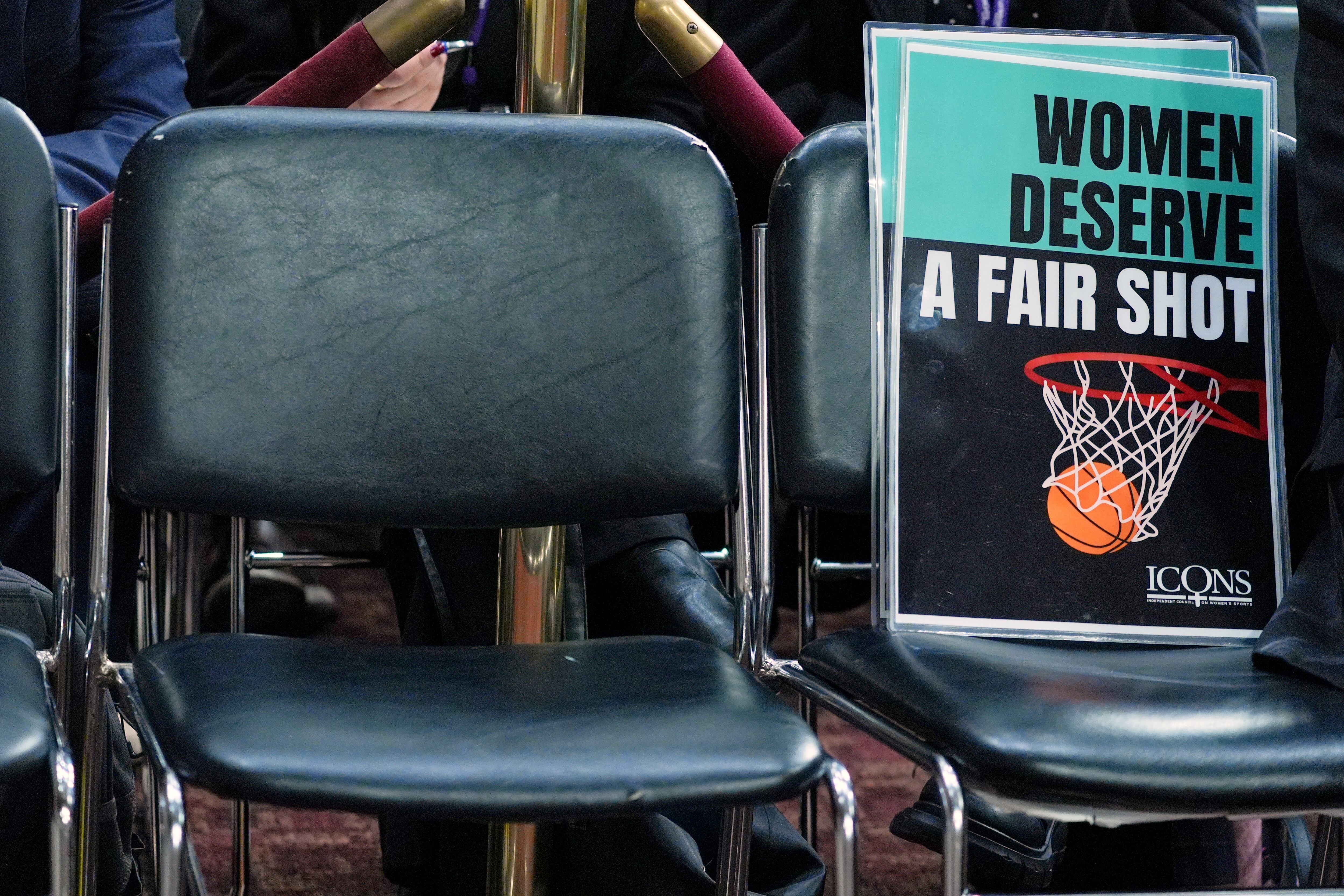 A sign is seen during a Senate hearing on Capitol Hill, Wednesday, in Washington. The Protect College Sports Act passed the Senate by a 77-22 vote late Monday.