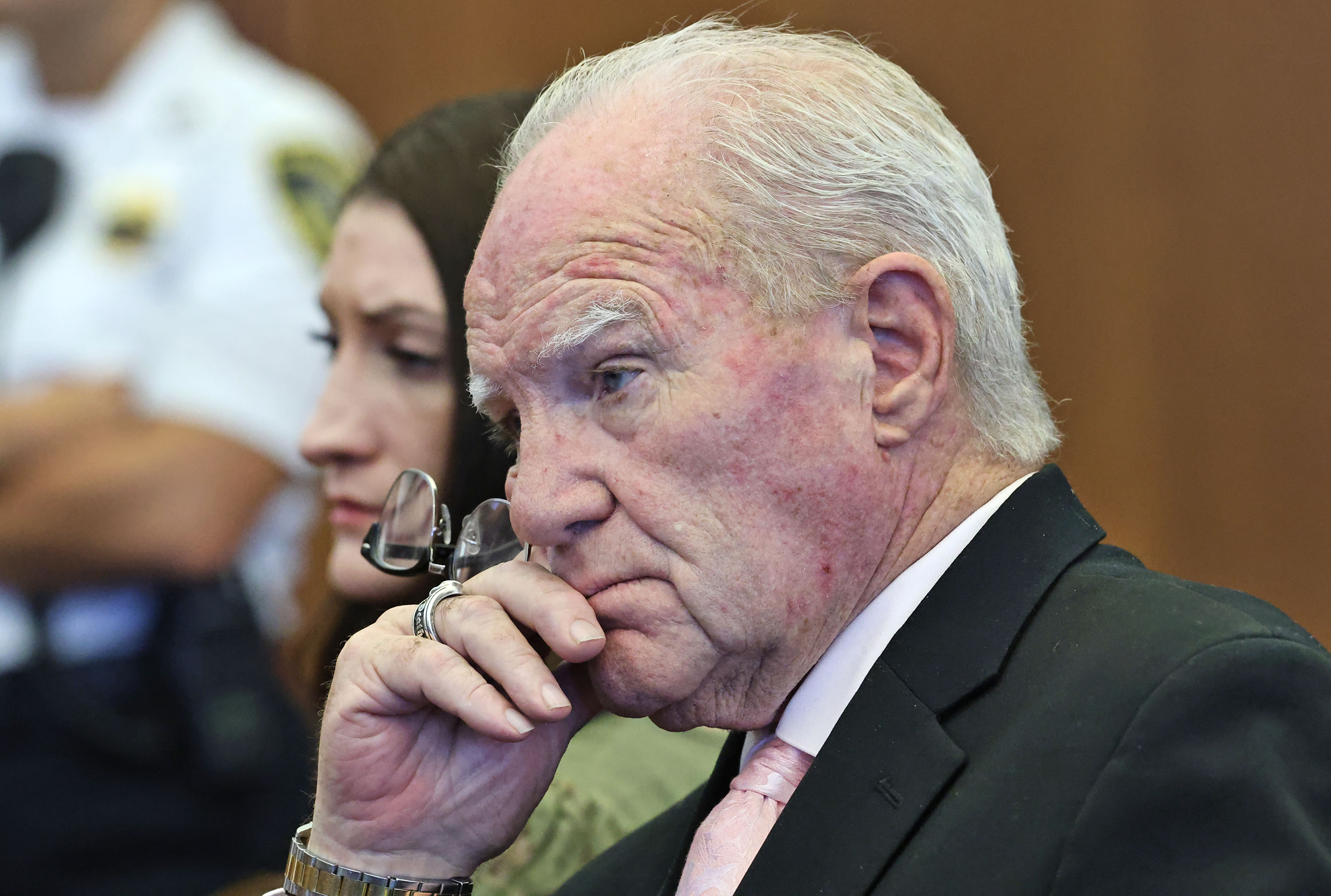 Defense attorney Kevin Reddington and defendant Lindsay Clancy listen to Judge William Sullivan speak with the jury after declaring a mistrial at court in Plymouth, Mass., on Friday, Sept. 4.