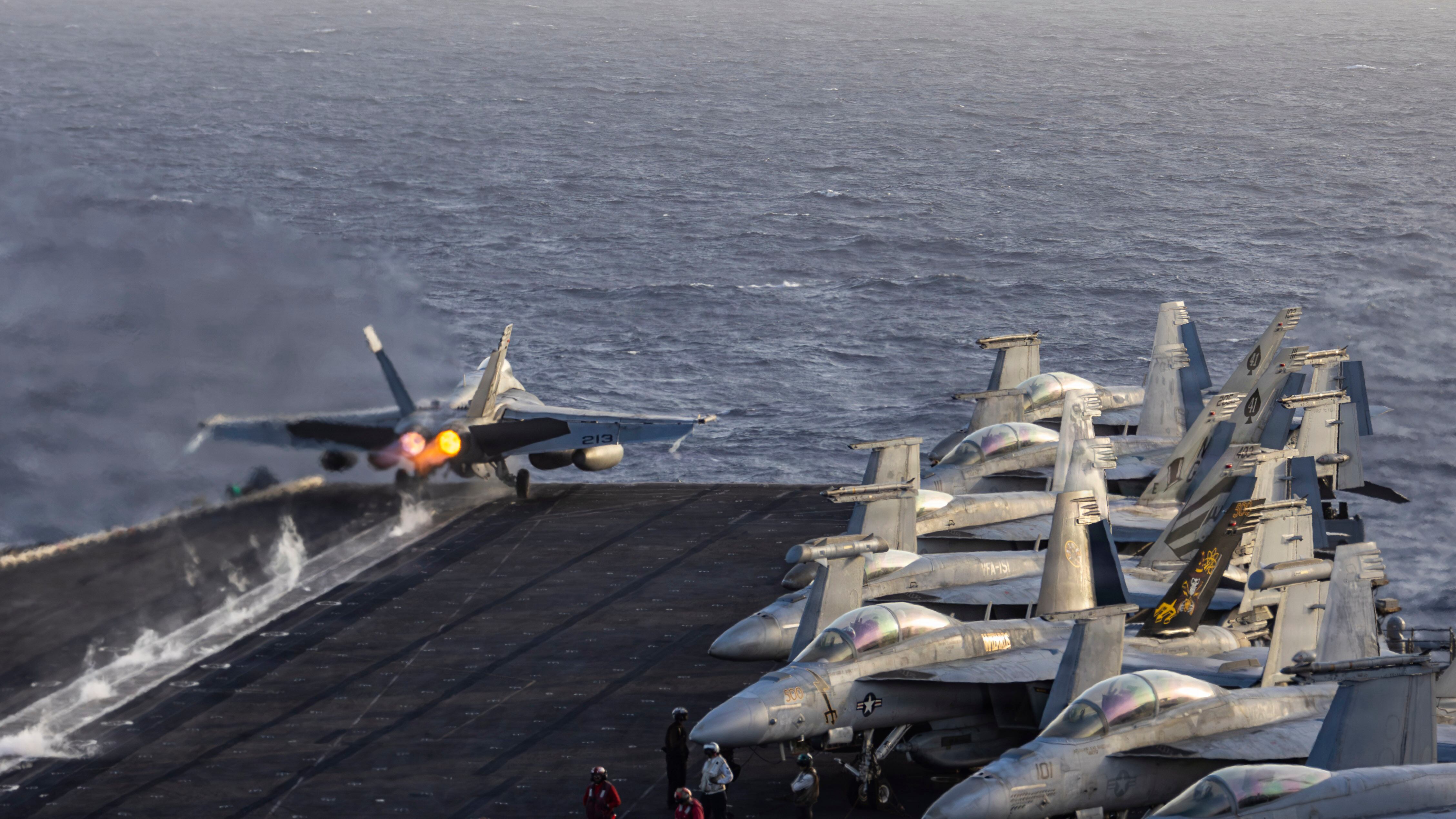 An F/A-18E Super Hornet, attached to Strike Fighter Squadron 14, launches from the flight deck of Nimitz-class aircraft carrier USS Abraham Lincoln on June 10, 2026. Abraham Lincoln is deployed to the U.S. 5th Fleet area of operations to support maritime security and stability in the Middle East.