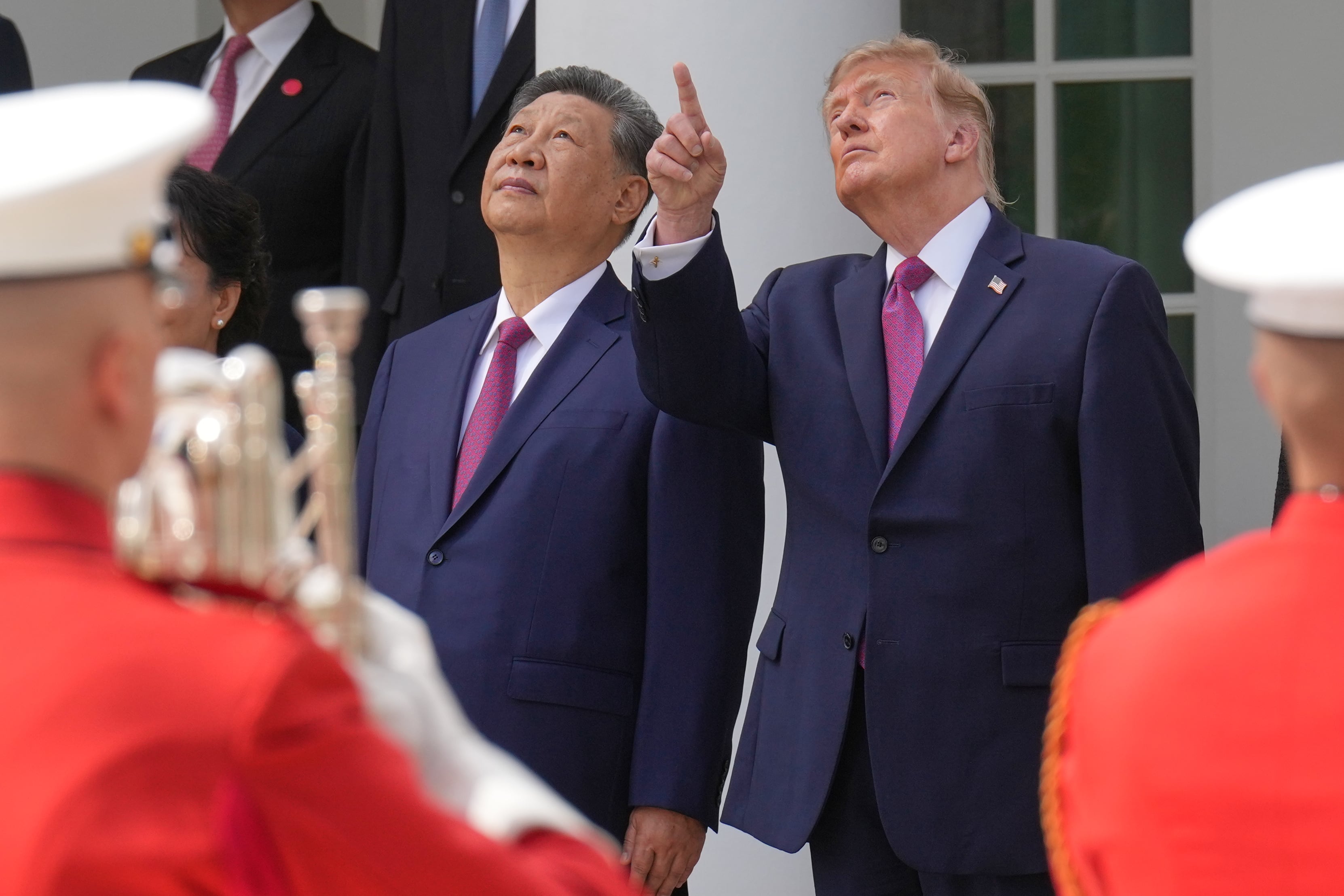 President Donald Trump and China's President Xi Jinping watch a flyover during a military review in the Rose Garden of the White House, Thursday, Sept. 24, 2026, in Washington.