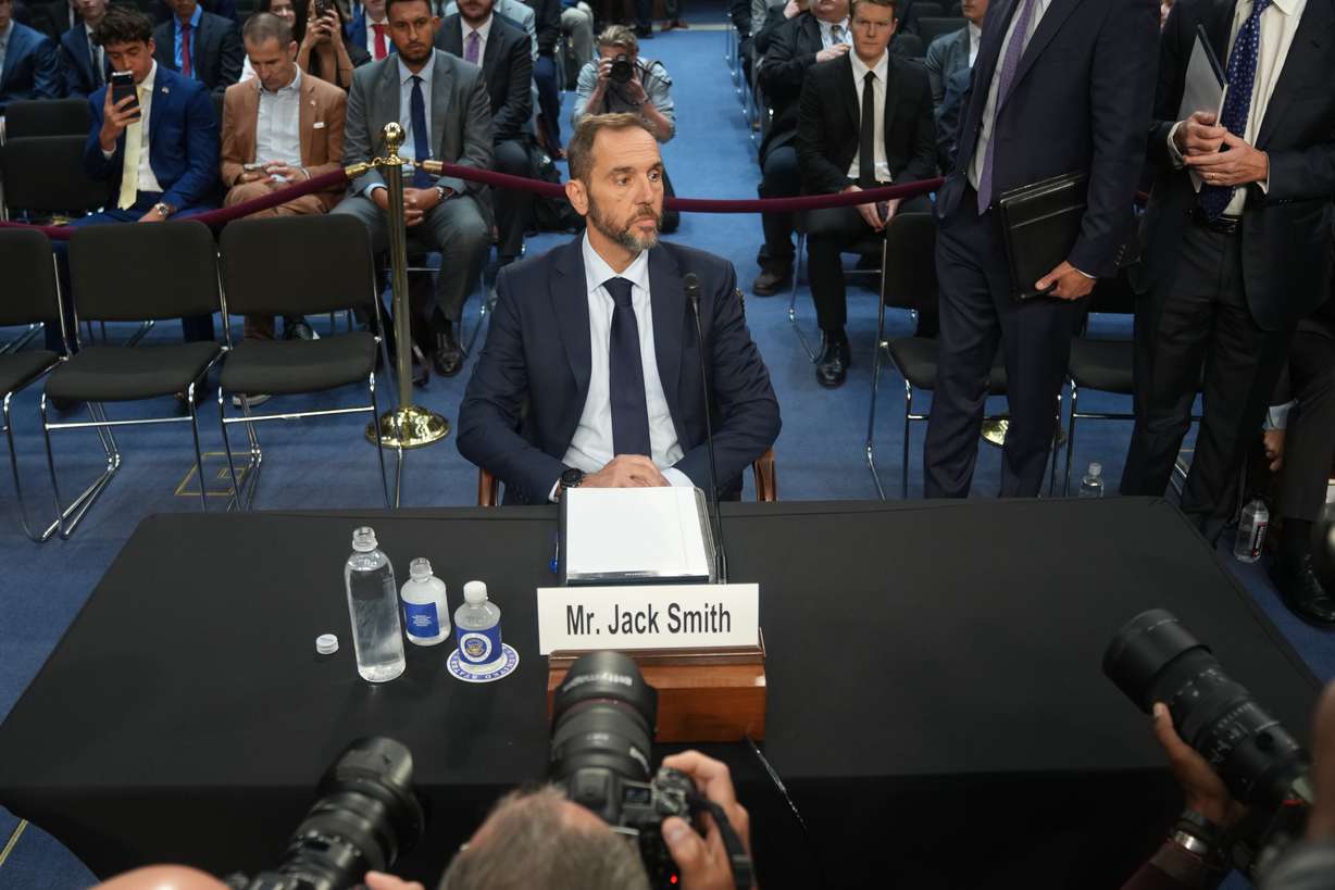 Former Justice Department special counsel Jack Smith is seated before he testifies before the Senate Judiciary Committee at the Capitol, Tuesday, in Washington. Smith defended his work as committee Republicans grilled him on his investigative tactics.