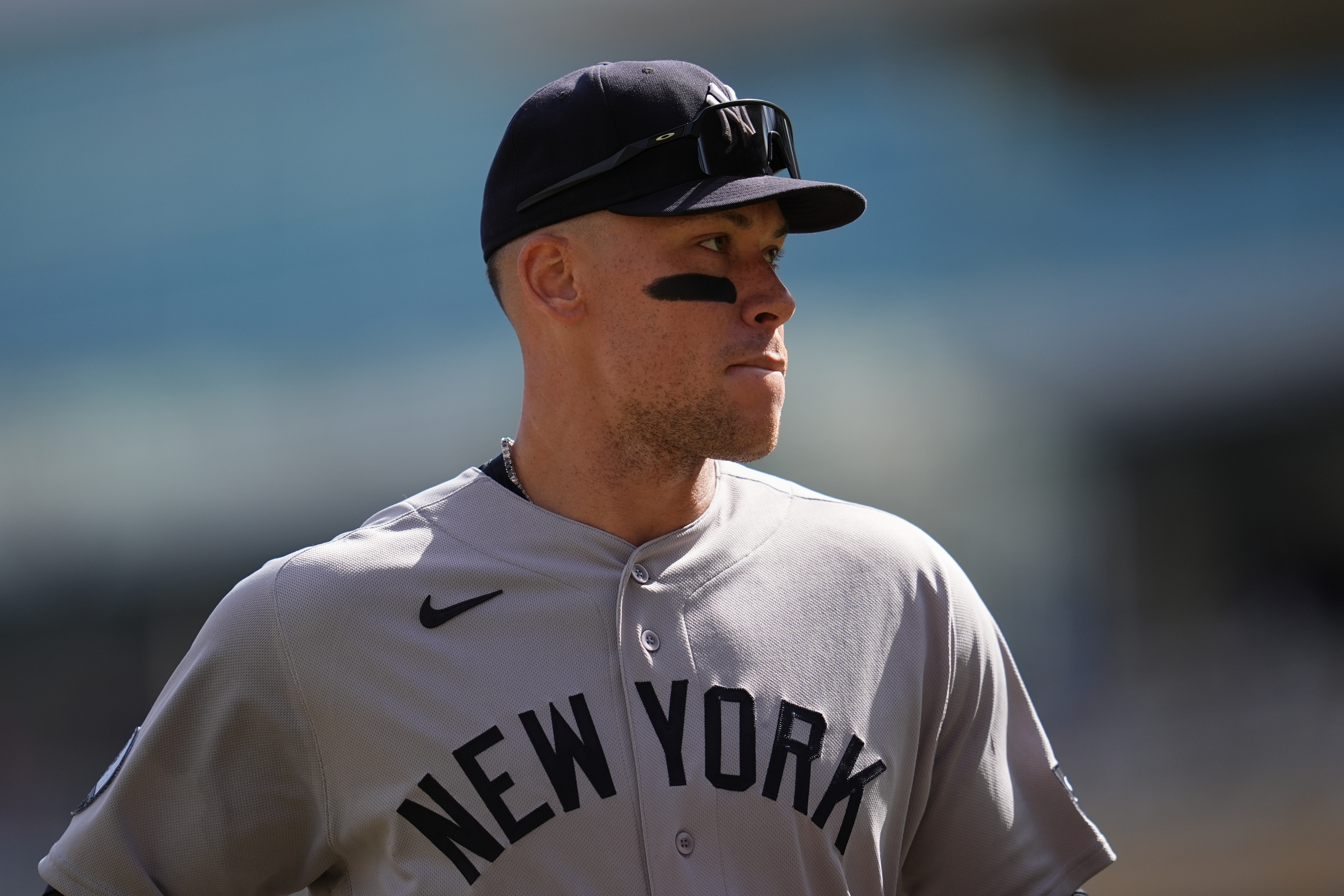 New York Yankees' Aaron Judge walks back to the dugout after the bottom of the fourth inning of a baseball game against the Minnesota Twins, Wednesday, Sept. 16, 2026, in Minneapolis. 