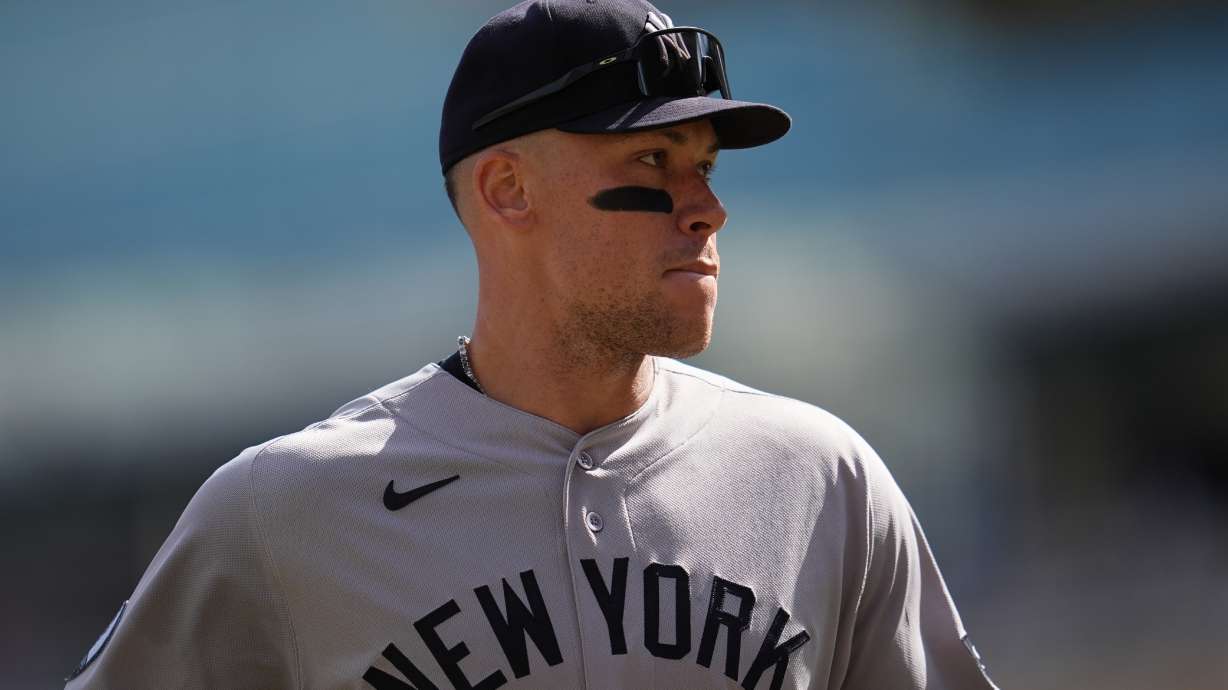 New York Yankees' Aaron Judge walks back to the dugout after the bottom of the fourth inning of a baseball game against the Minnesota Twins, Wednesday, Sept. 16, 2026, in Minneapolis.