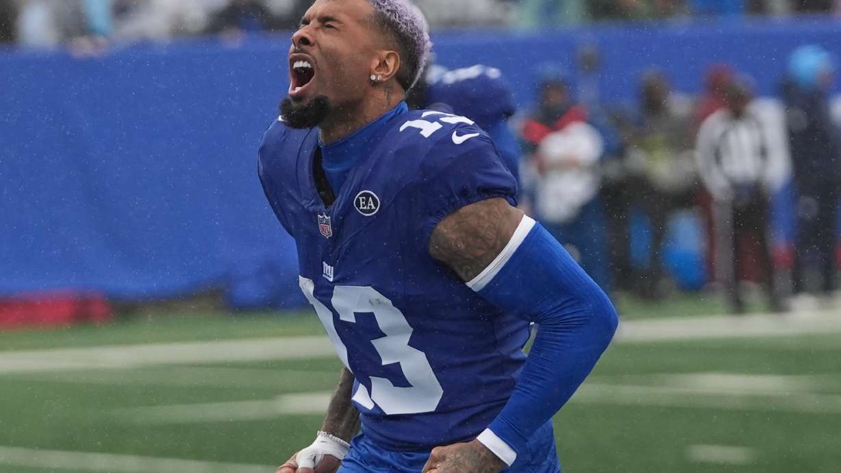 New York Giants wide receiver Odell Beckham Jr. (13) screams as he runs onto the field before an NFL football game against the Tennessee Titans in East Rutherford, N.J., Sunday, Sept. 27, 2026.