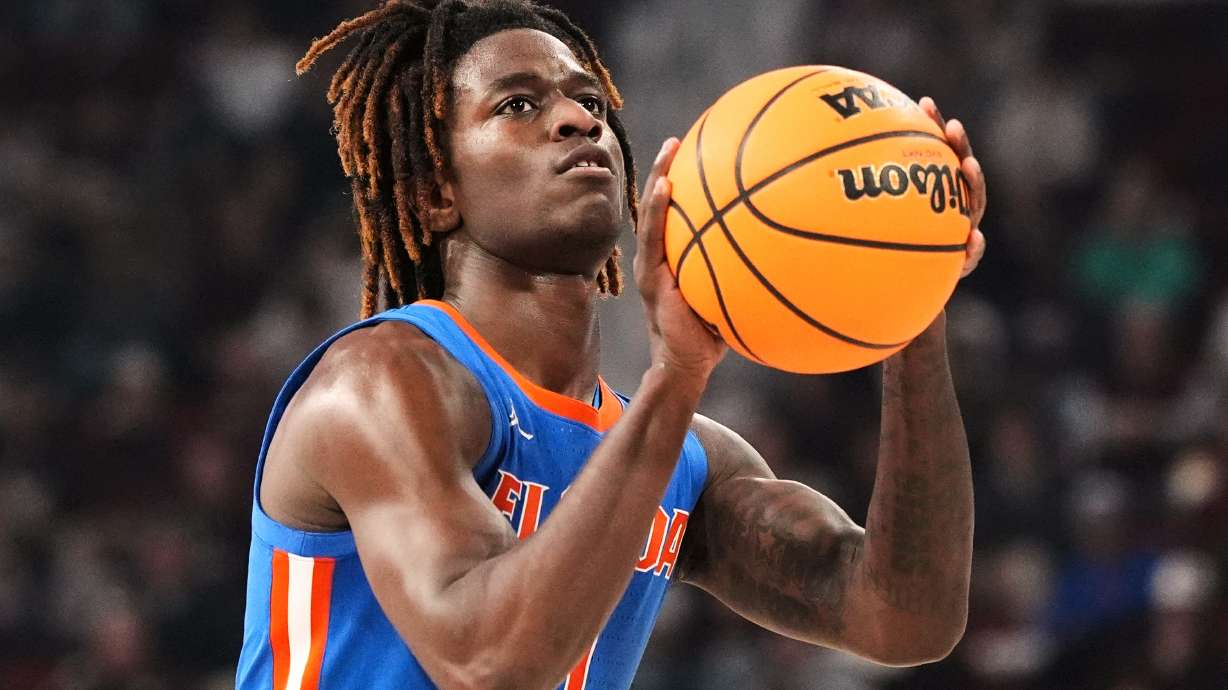 FILE - Florida guard Denzel Aberdeen shoots a free throw during the first half of their NCAA college basketball game against Mississippi State, Feb. 11, 2025, in Starkville, Miss.