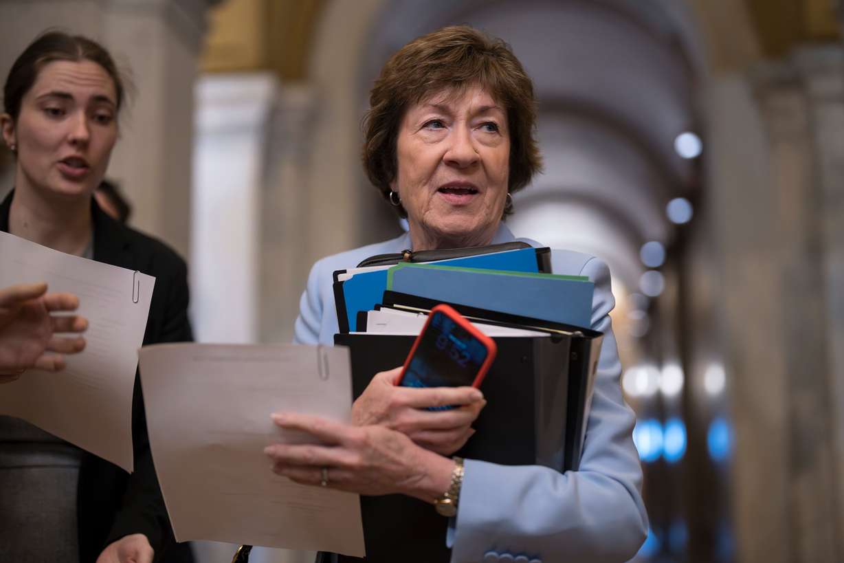 Sen. Susan Collins, R-Maine, a member of the Senate Intelligence Committee, arrives at the Capitol, June 17. Collins criticized the Office of Management and Budget for withholding funding.