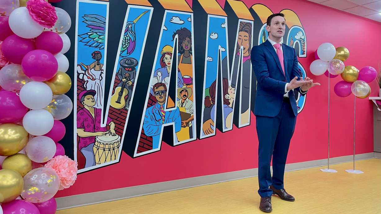 Vamos Health CEO John Woolley speaks at the launch of a new, larger site in West Valley City on Tuesday. The site reflects strong demand for its offerings, provided in Spanish and English.